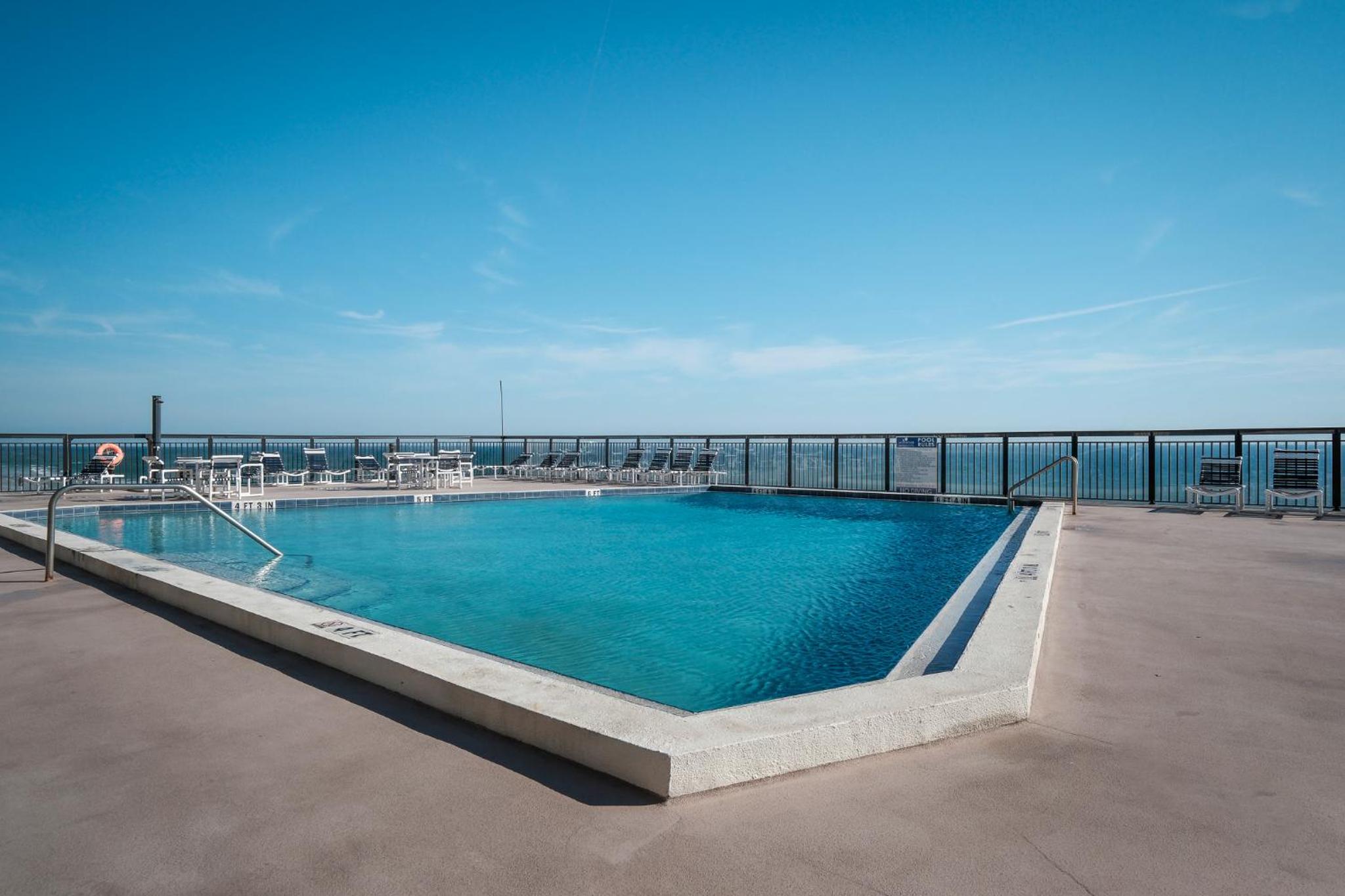 New Listing! Dog-friendly direct oceanfront with private balcony and heated rooftop pool