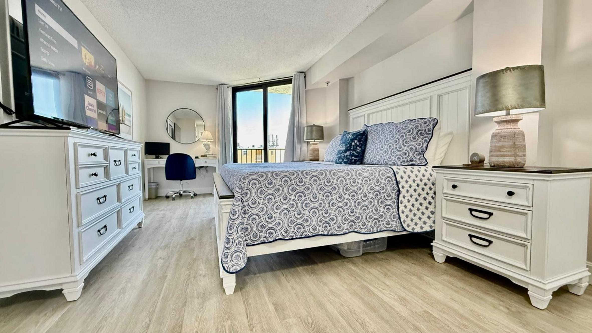 Top-floor ocean view condo with a private balcony and beachfront pool