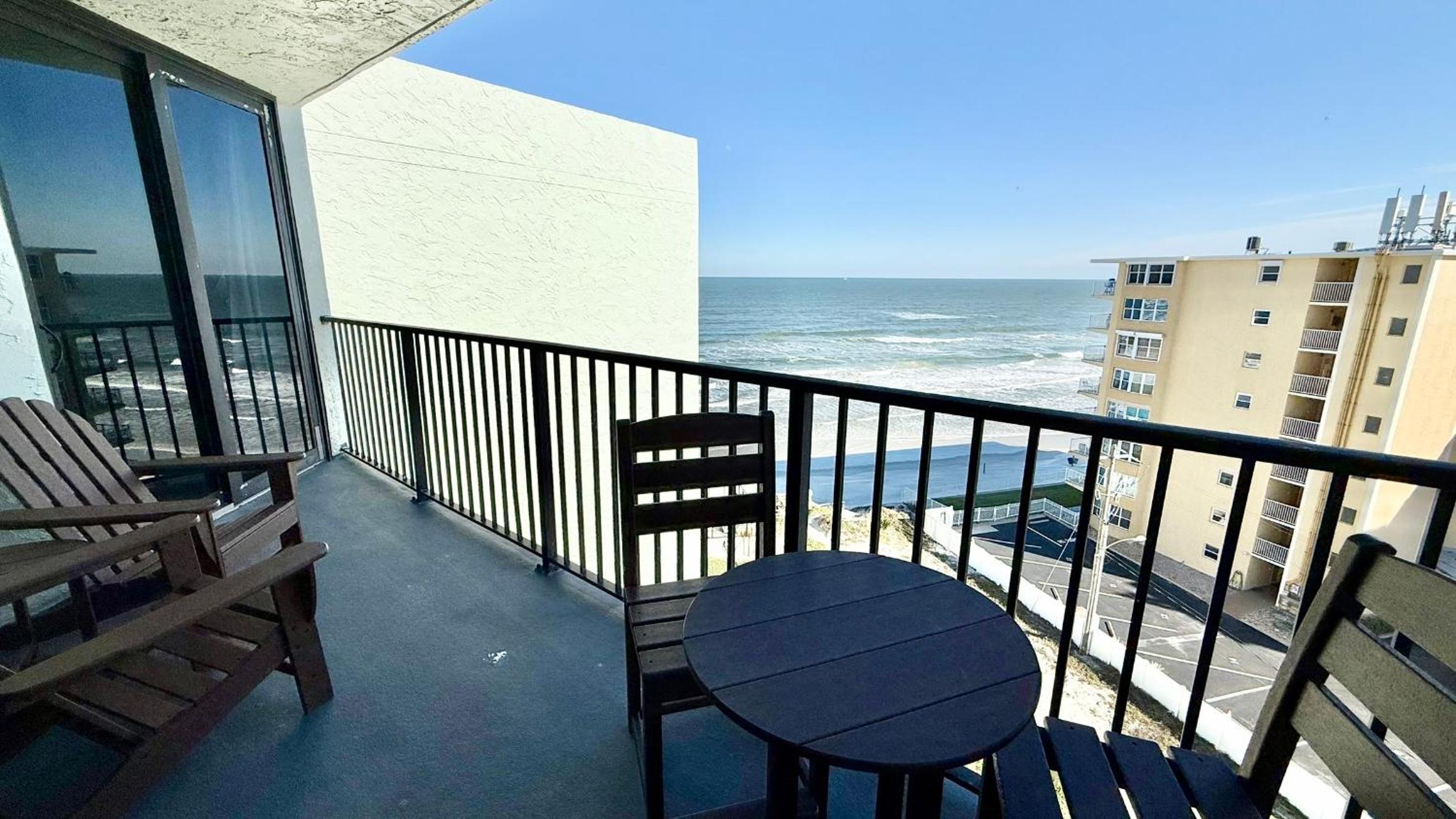 Top-floor ocean view condo with a private balcony and beachfront pool