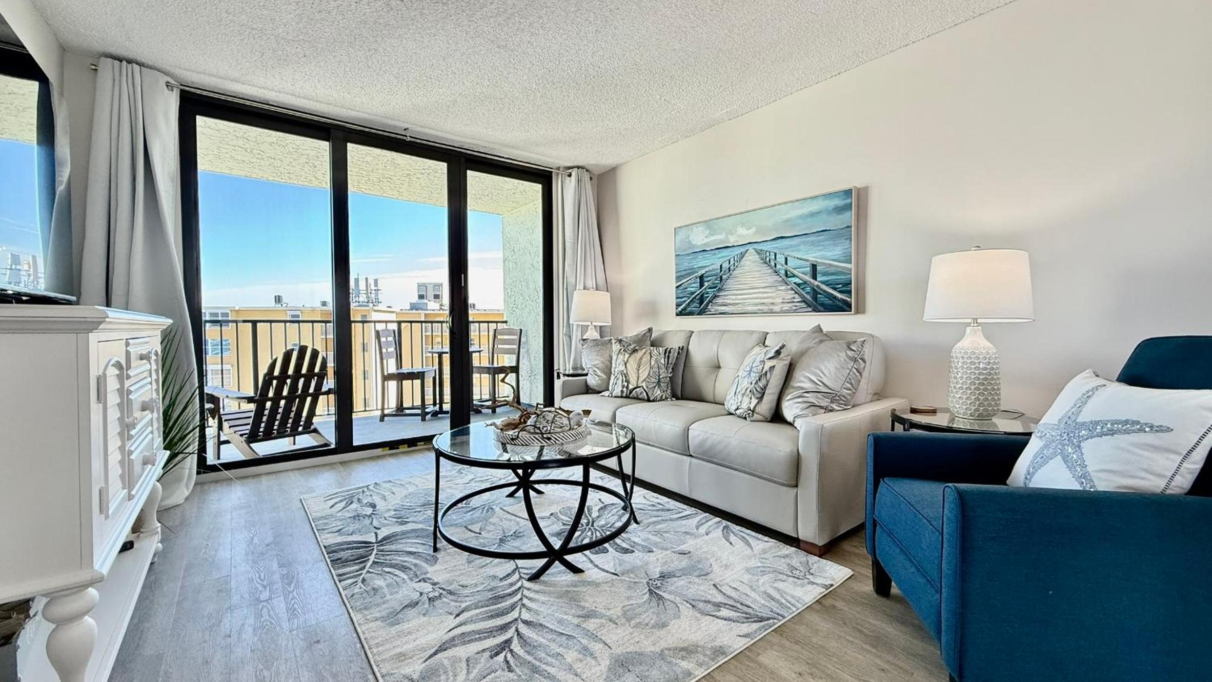 Top-floor ocean view condo with a private balcony and beachfront pool