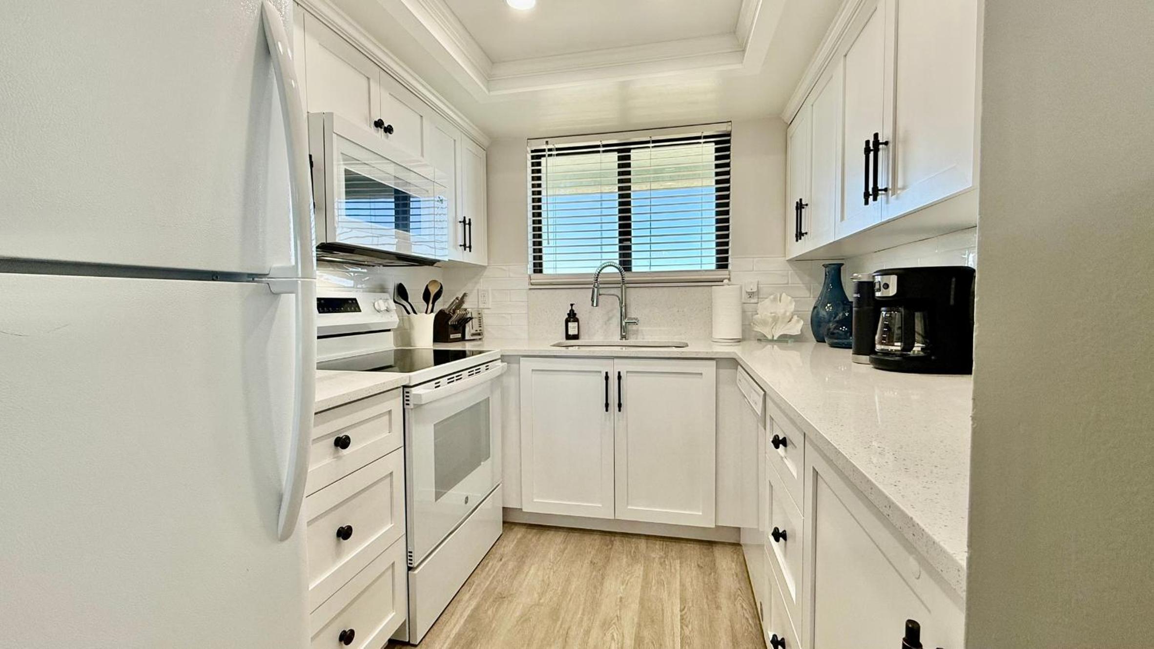Top-floor ocean view condo with a private balcony and beachfront pool