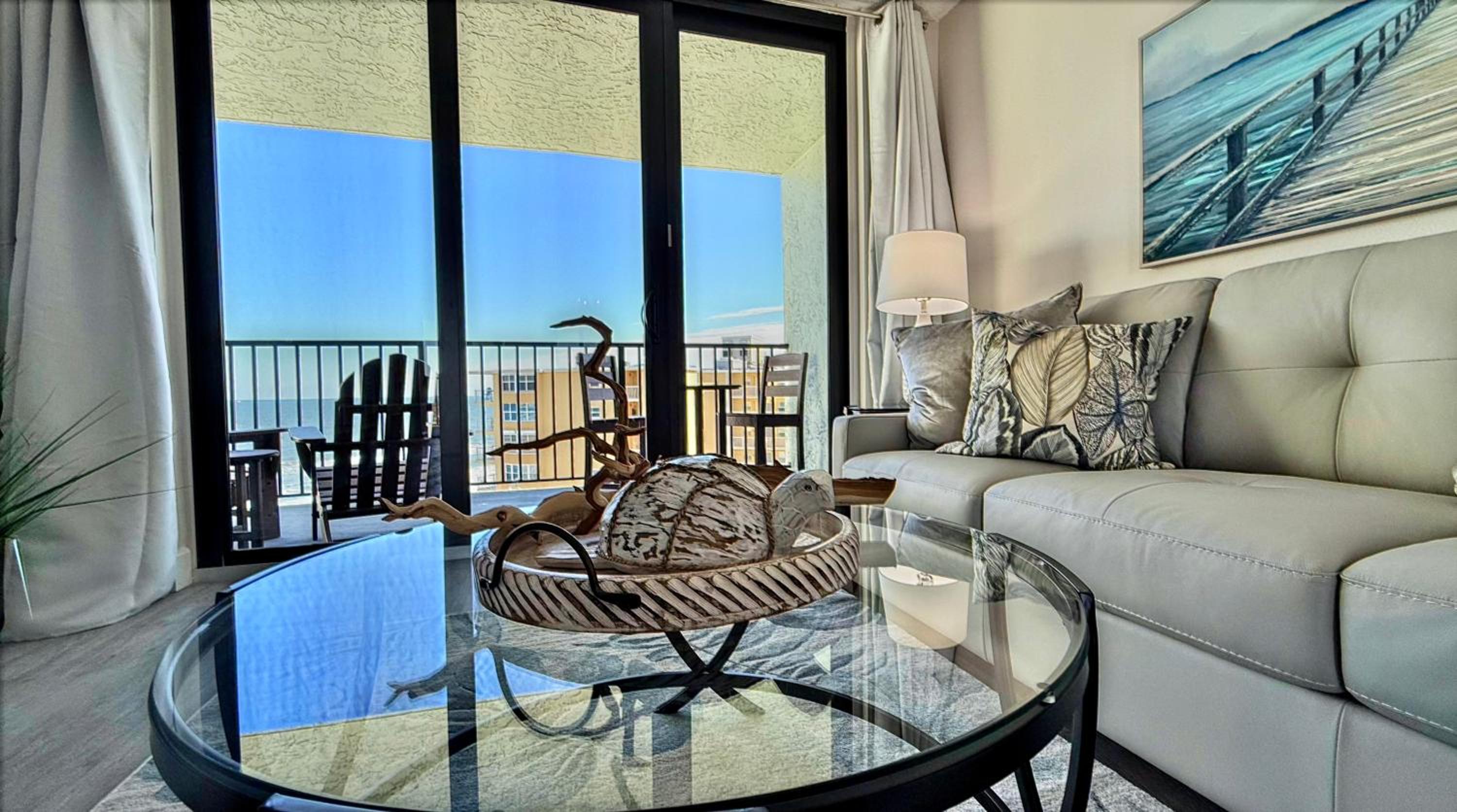 Top-floor ocean view condo with a private balcony and beachfront pool