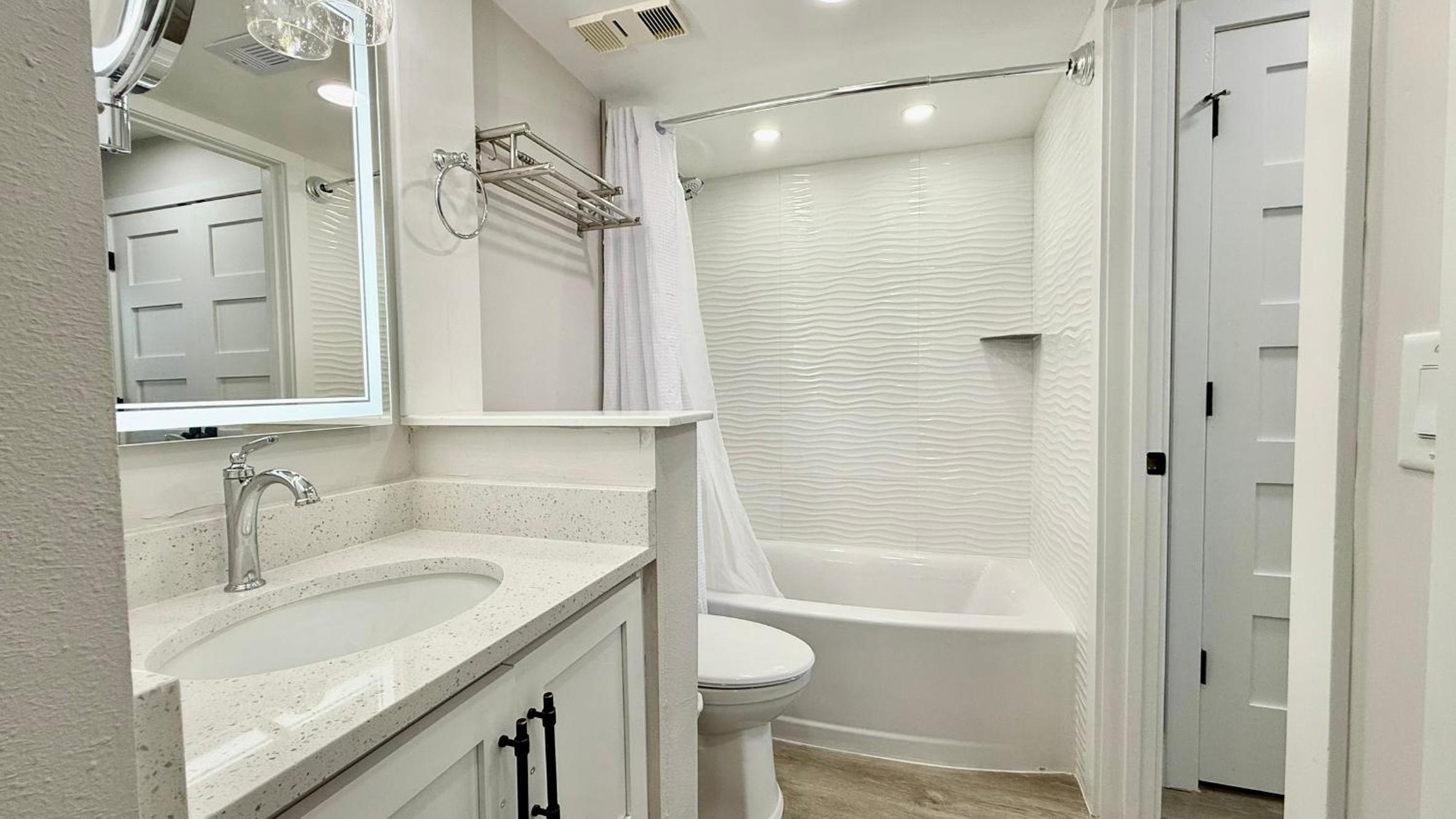 Top-floor ocean view condo with a private balcony and beachfront pool
