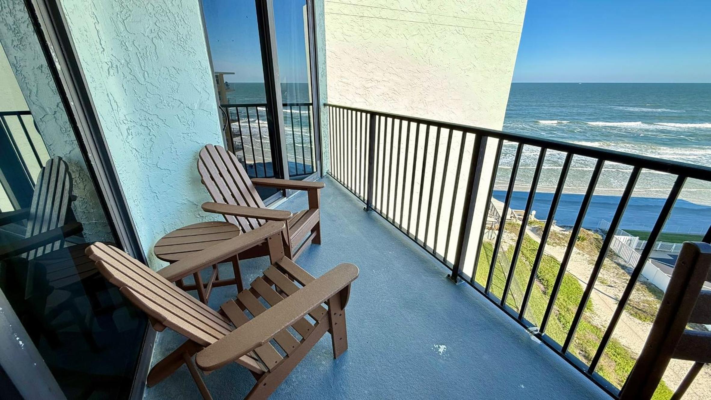 Top-floor ocean view condo with a private balcony and beachfront pool