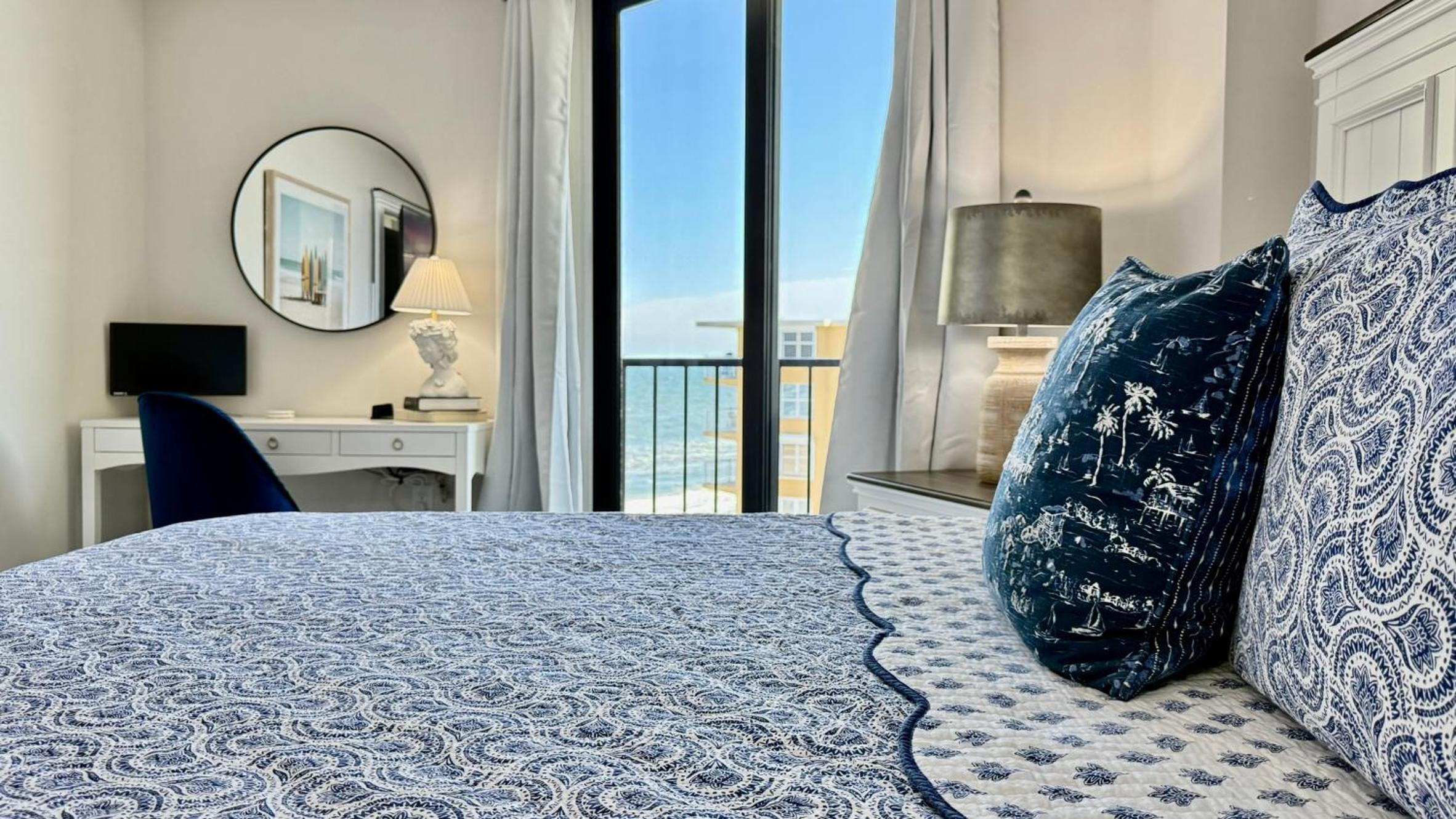 Top-floor ocean view condo with a private balcony and beachfront pool