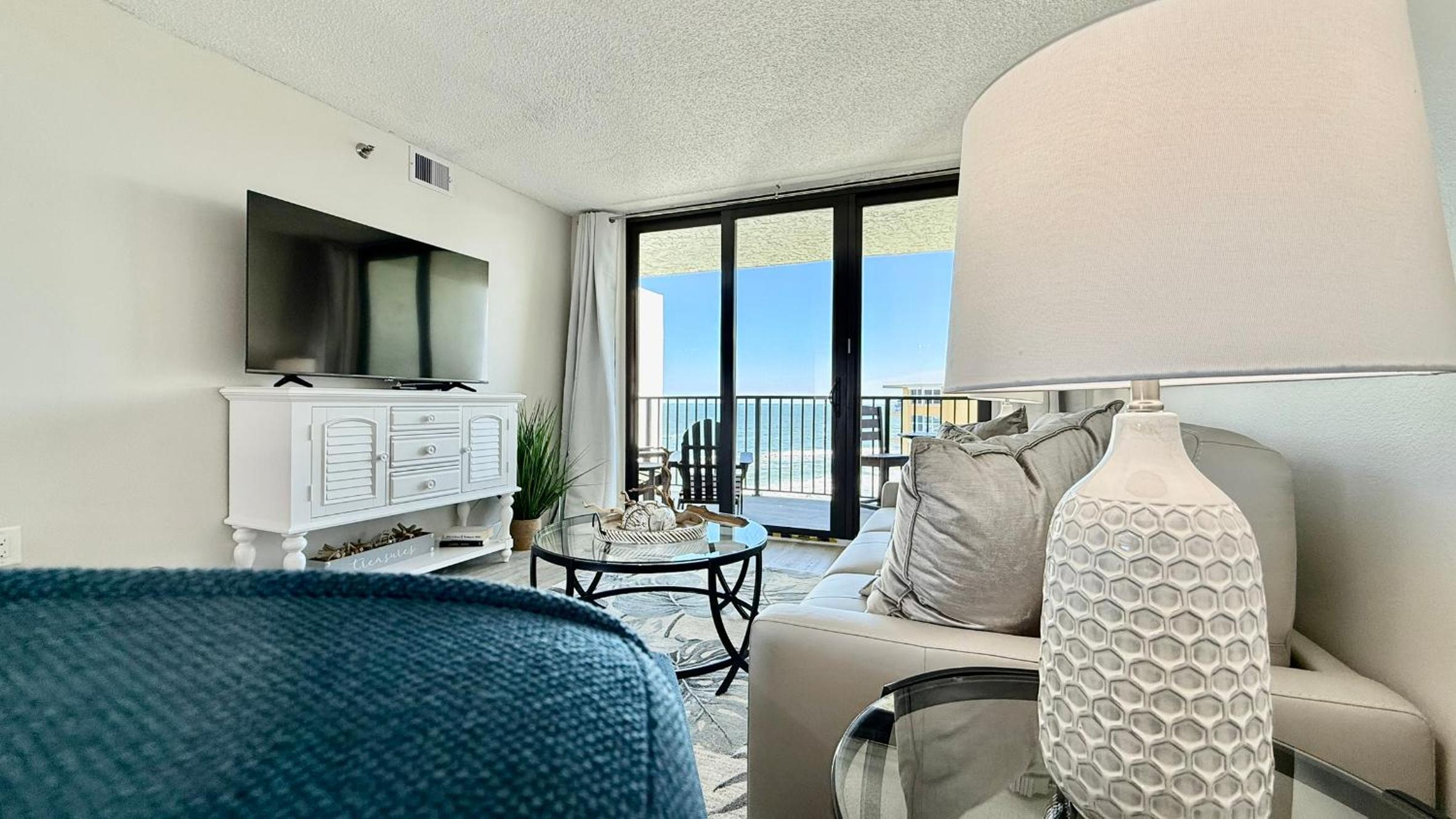 Top-floor ocean view condo with a private balcony and beachfront pool