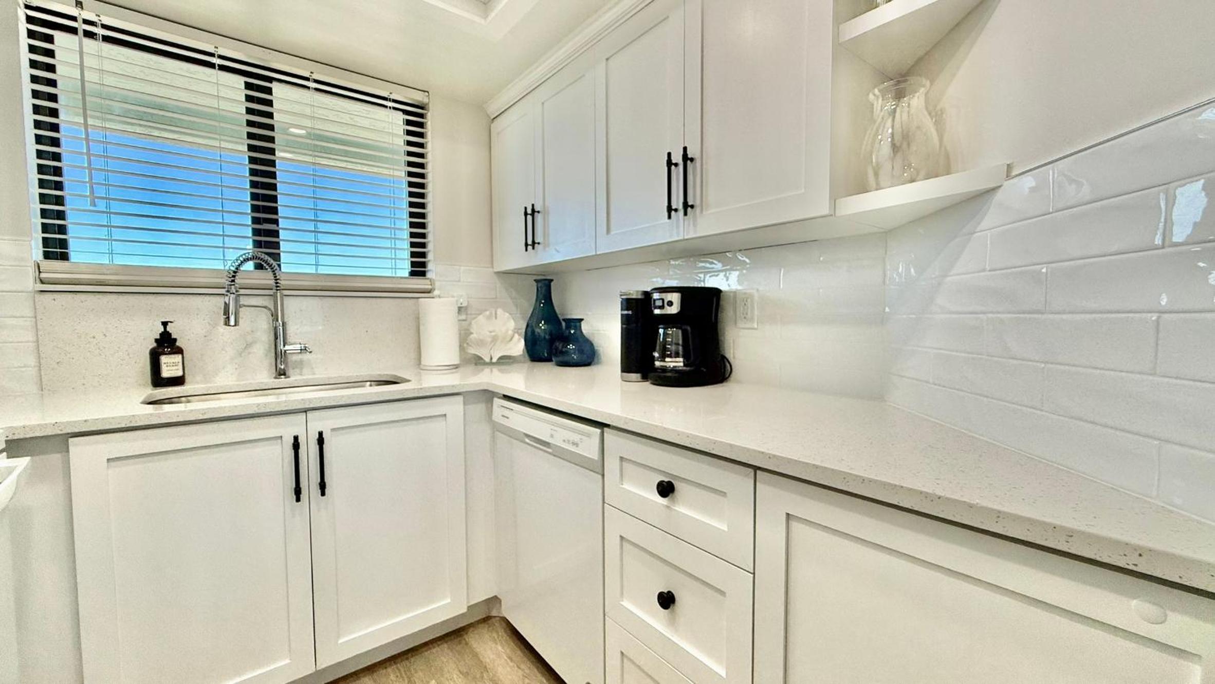 Top-floor ocean view condo with a private balcony and beachfront pool