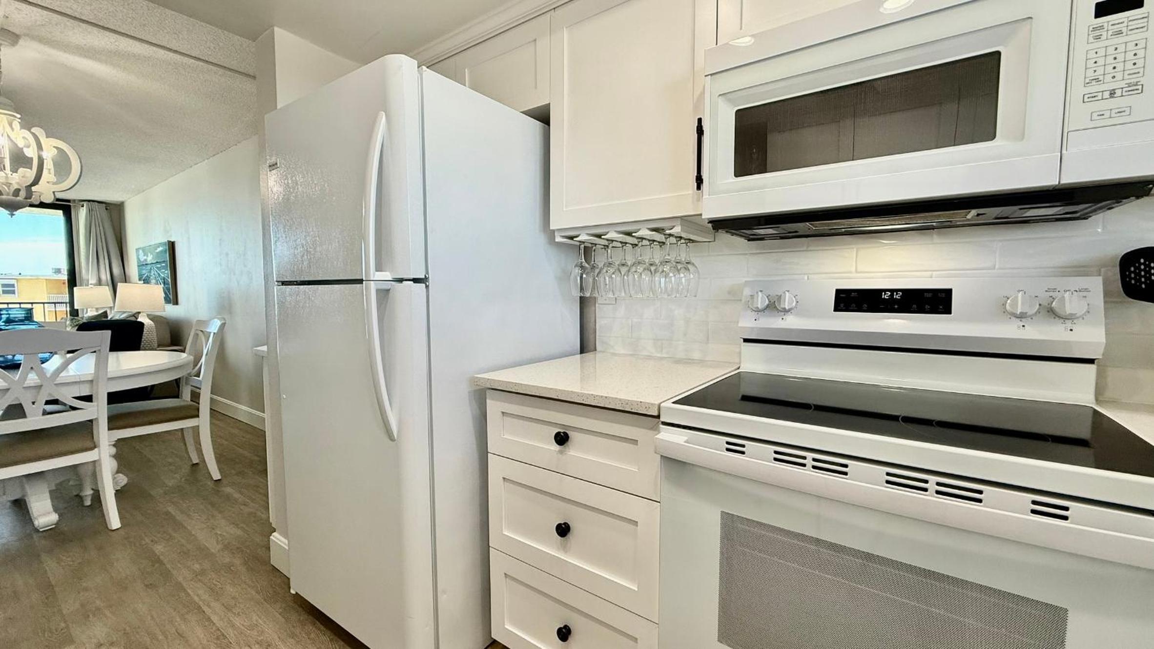 Top-floor ocean view condo with a private balcony and beachfront pool