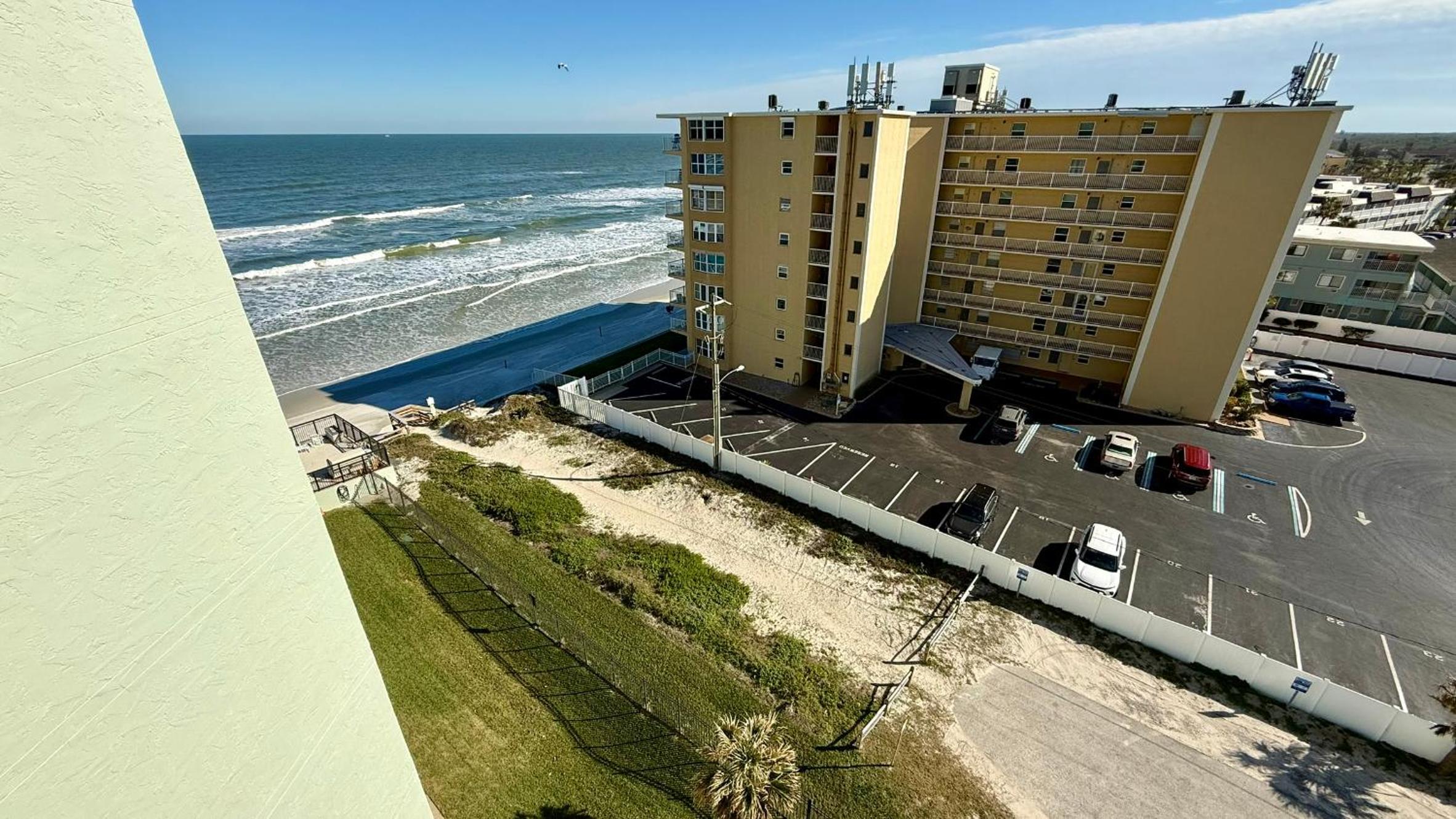 Top-floor ocean view condo with a private balcony and beachfront pool