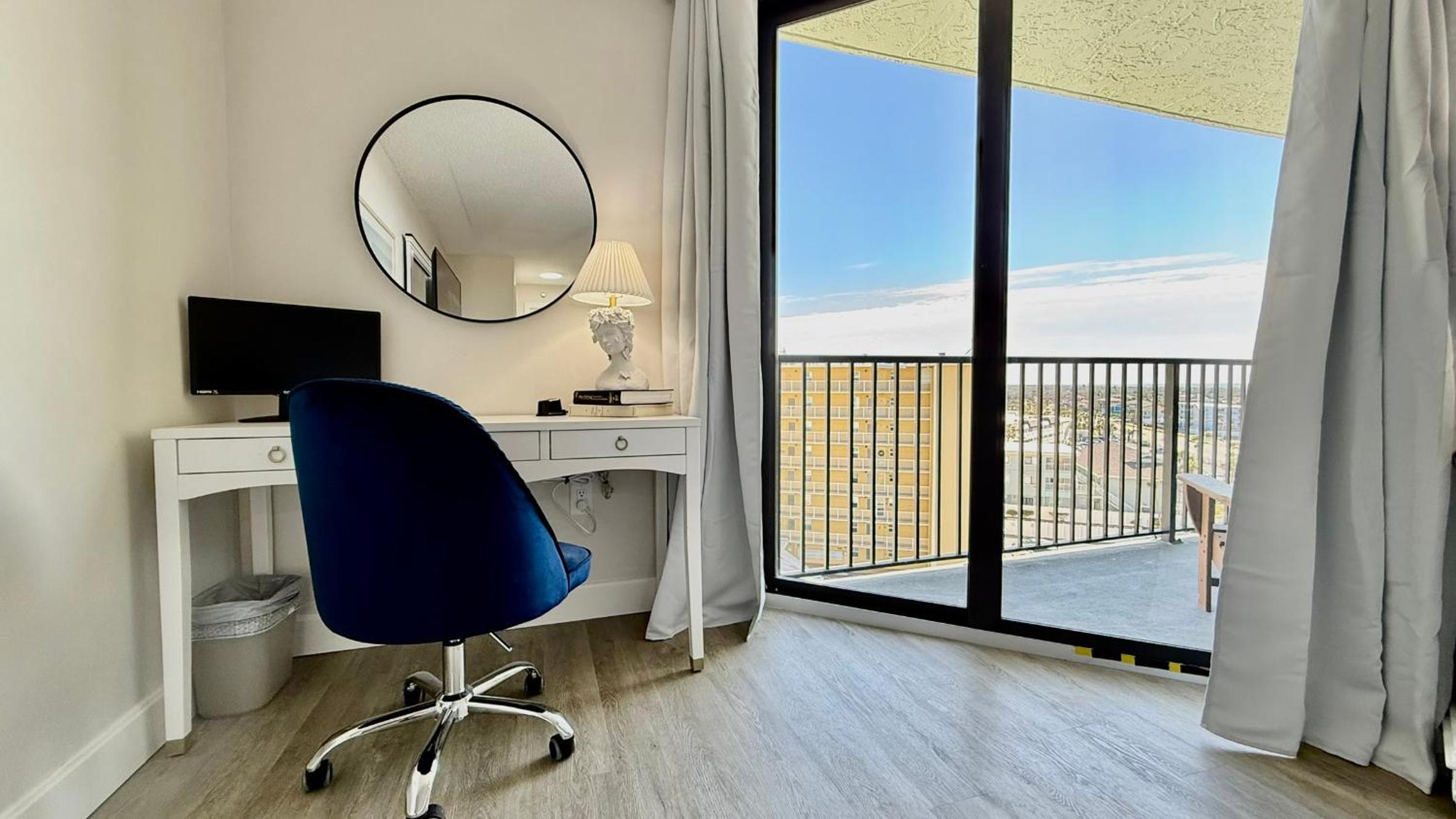 Top-floor ocean view condo with a private balcony and beachfront pool