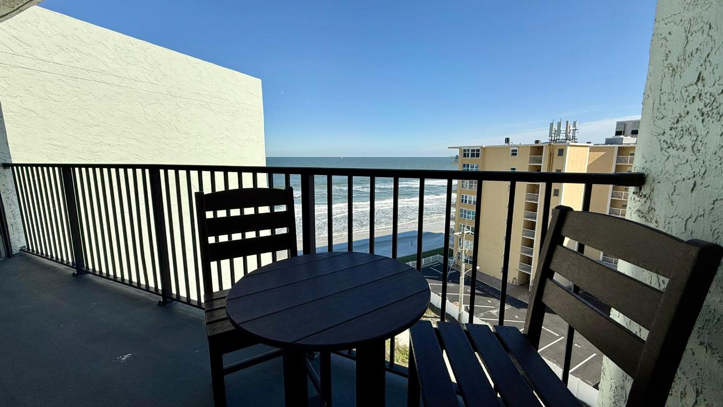 Top-floor ocean view condo with a private balcony and beachfront pool