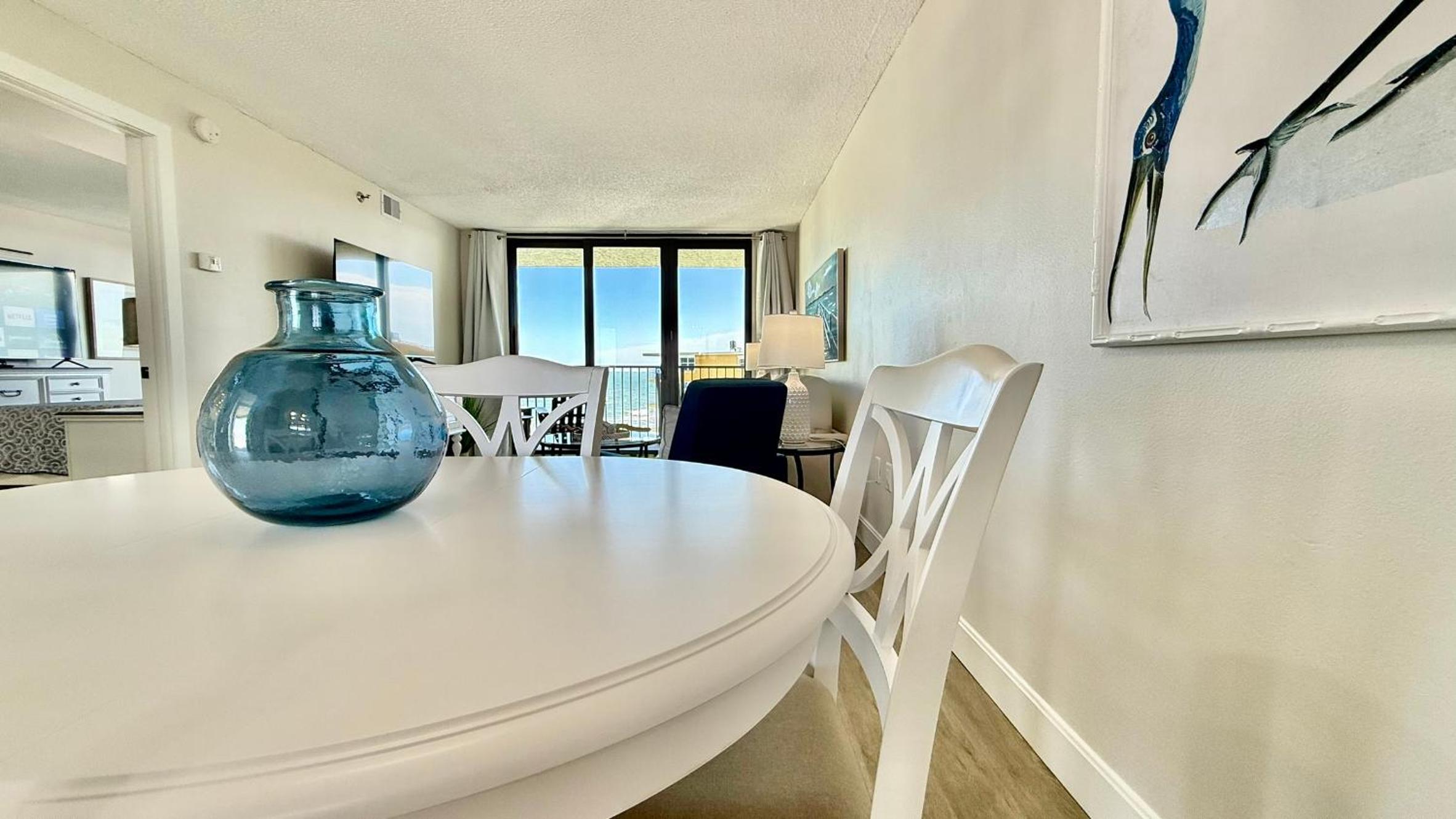 Top-floor ocean view condo with a private balcony and beachfront pool