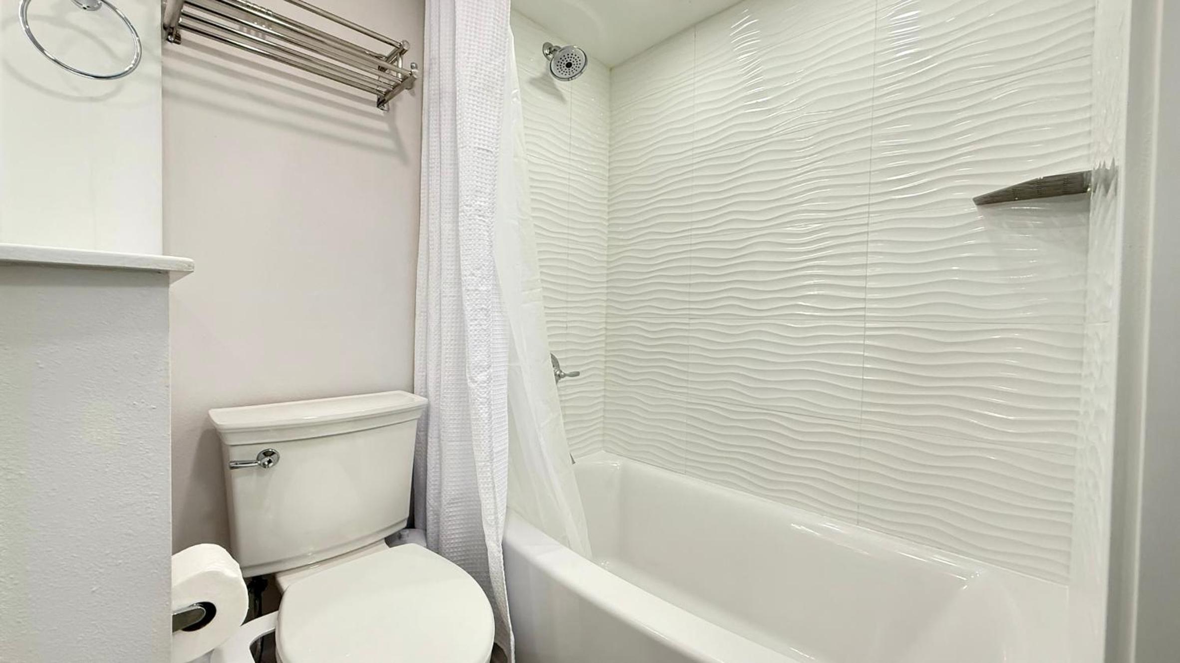 Top-floor ocean view condo with a private balcony and beachfront pool