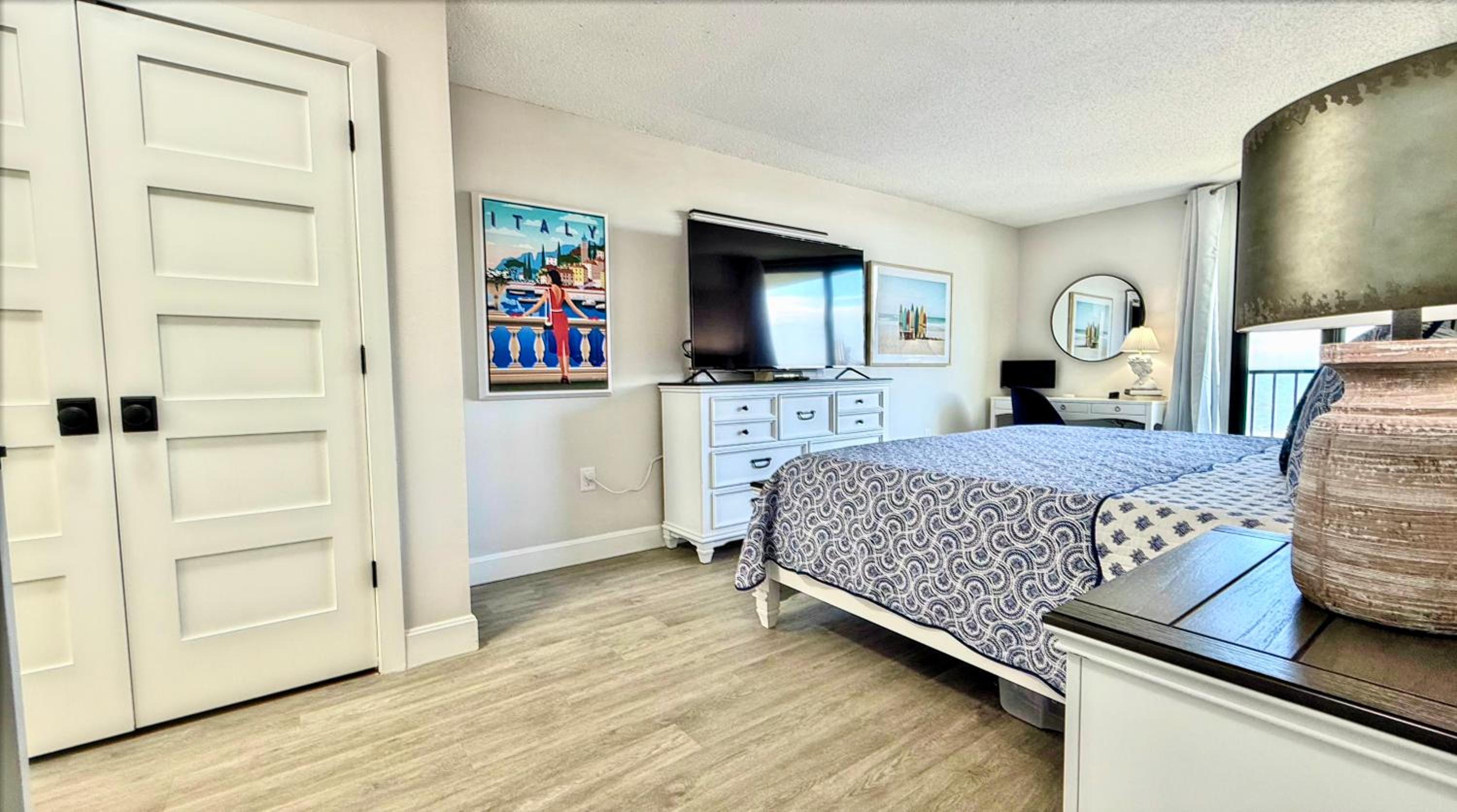 Top-floor ocean view condo with a private balcony and beachfront pool