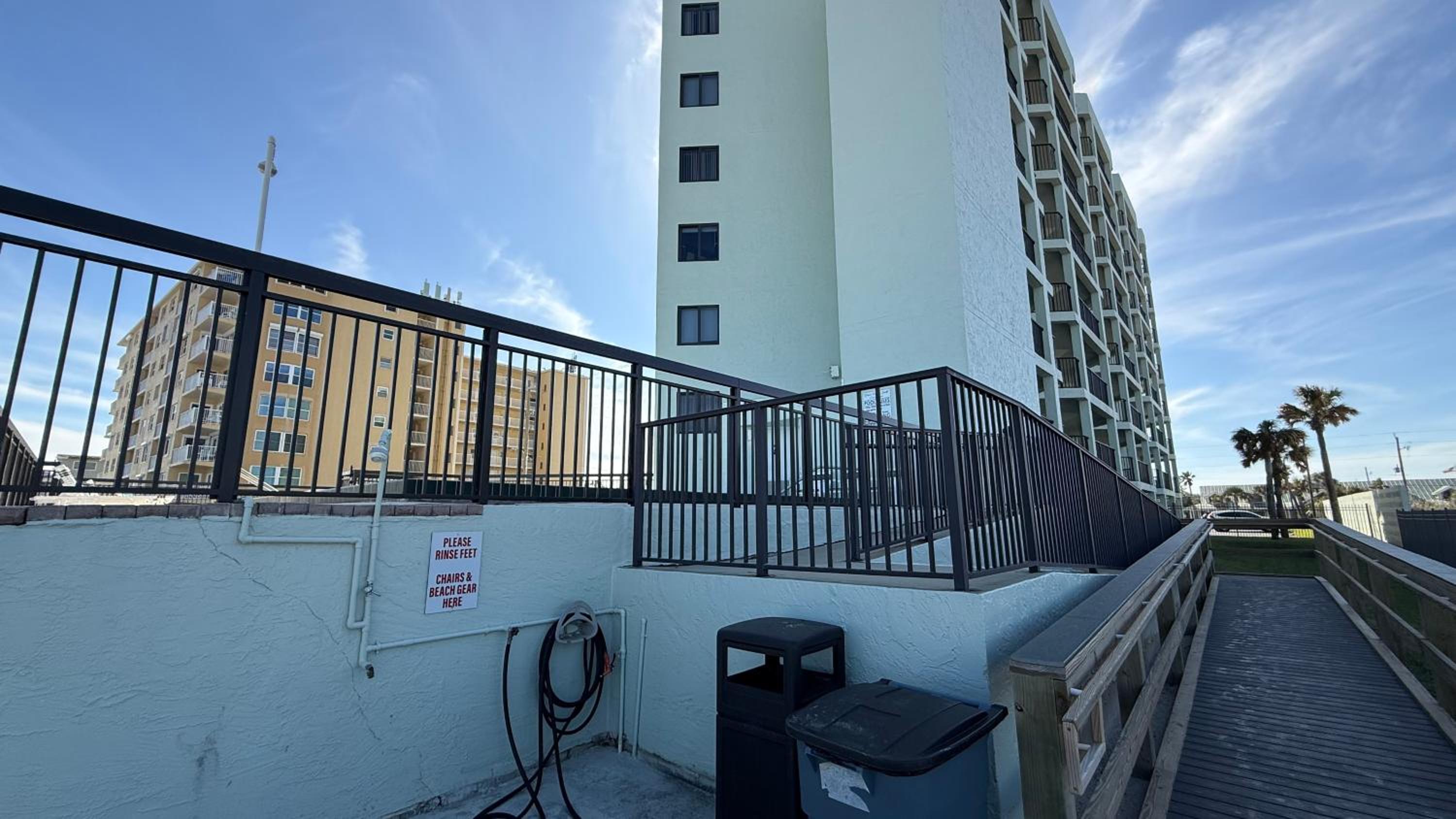Top-floor ocean view condo with a private balcony and beachfront pool