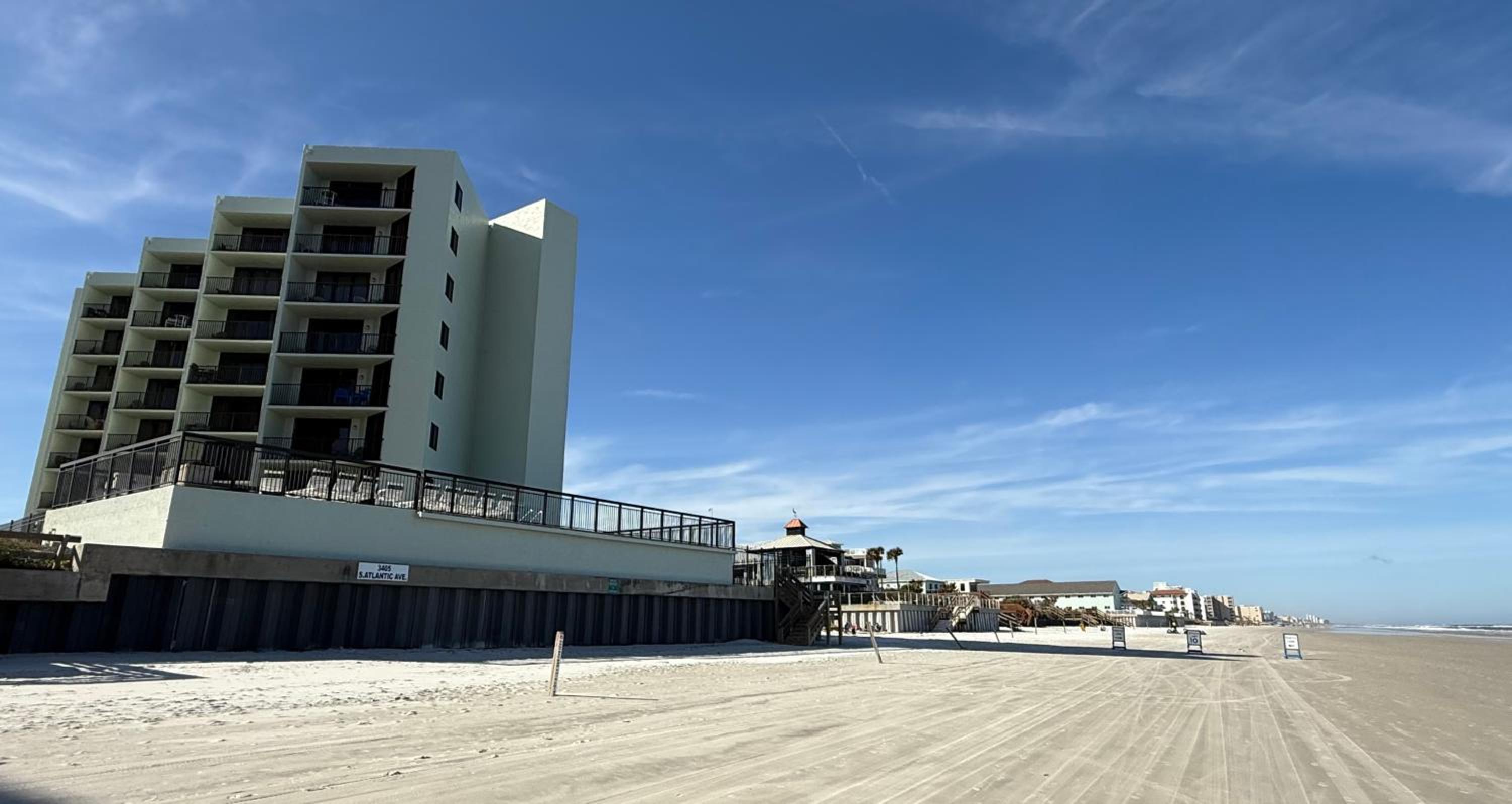 Top-floor ocean view condo with a private balcony and beachfront pool