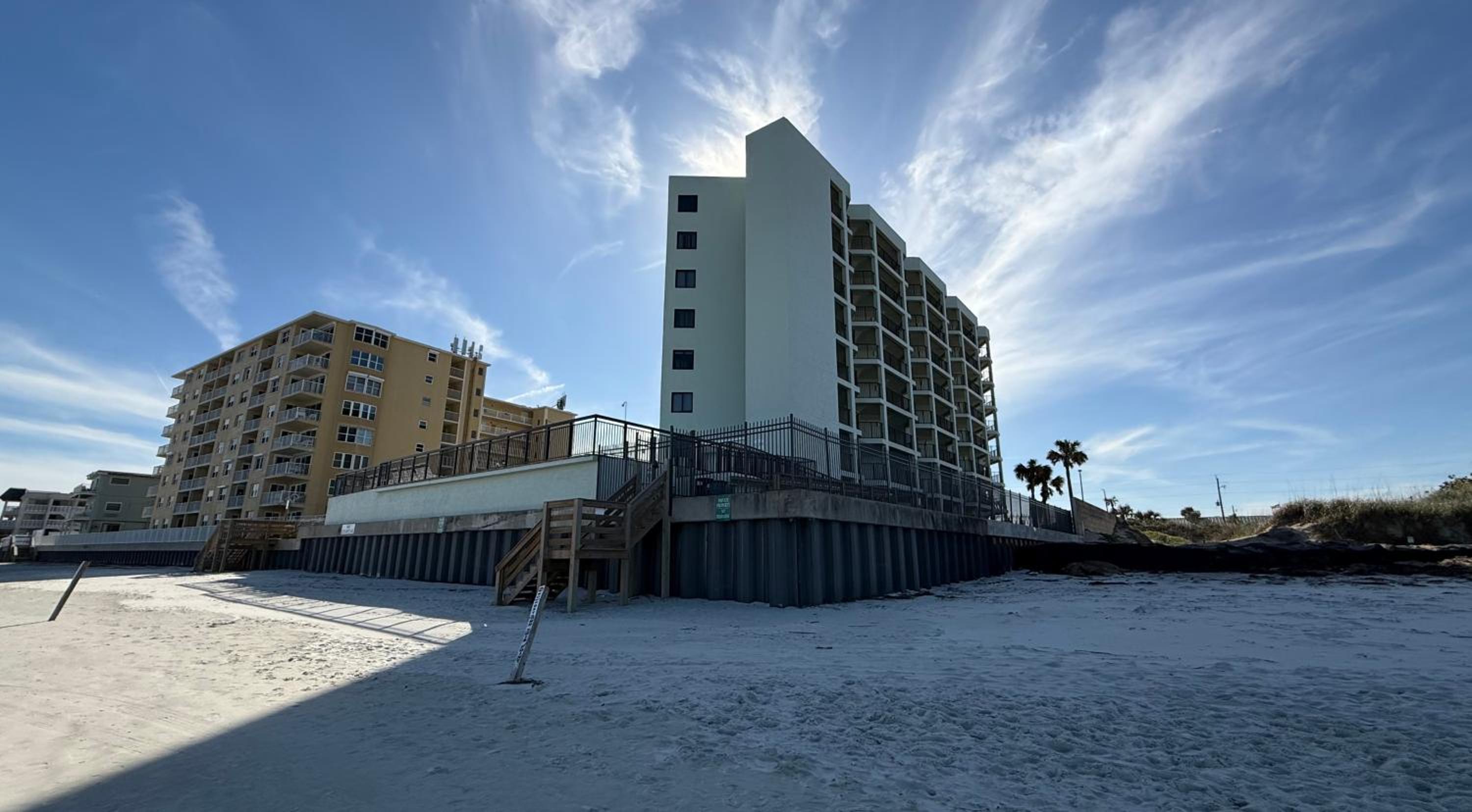 Top-floor ocean view condo with a private balcony and beachfront pool