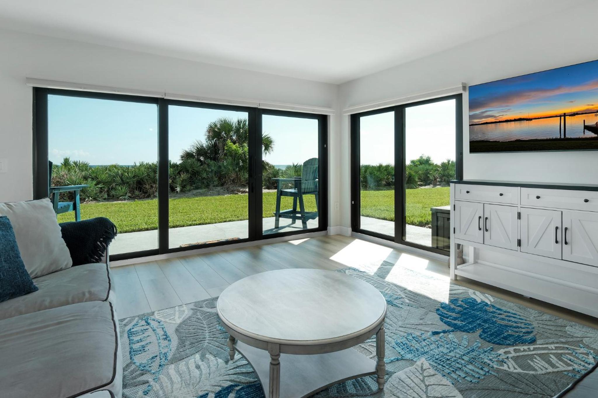 Updated direct oceanfront, ground floor condo with a heated pool and beach access