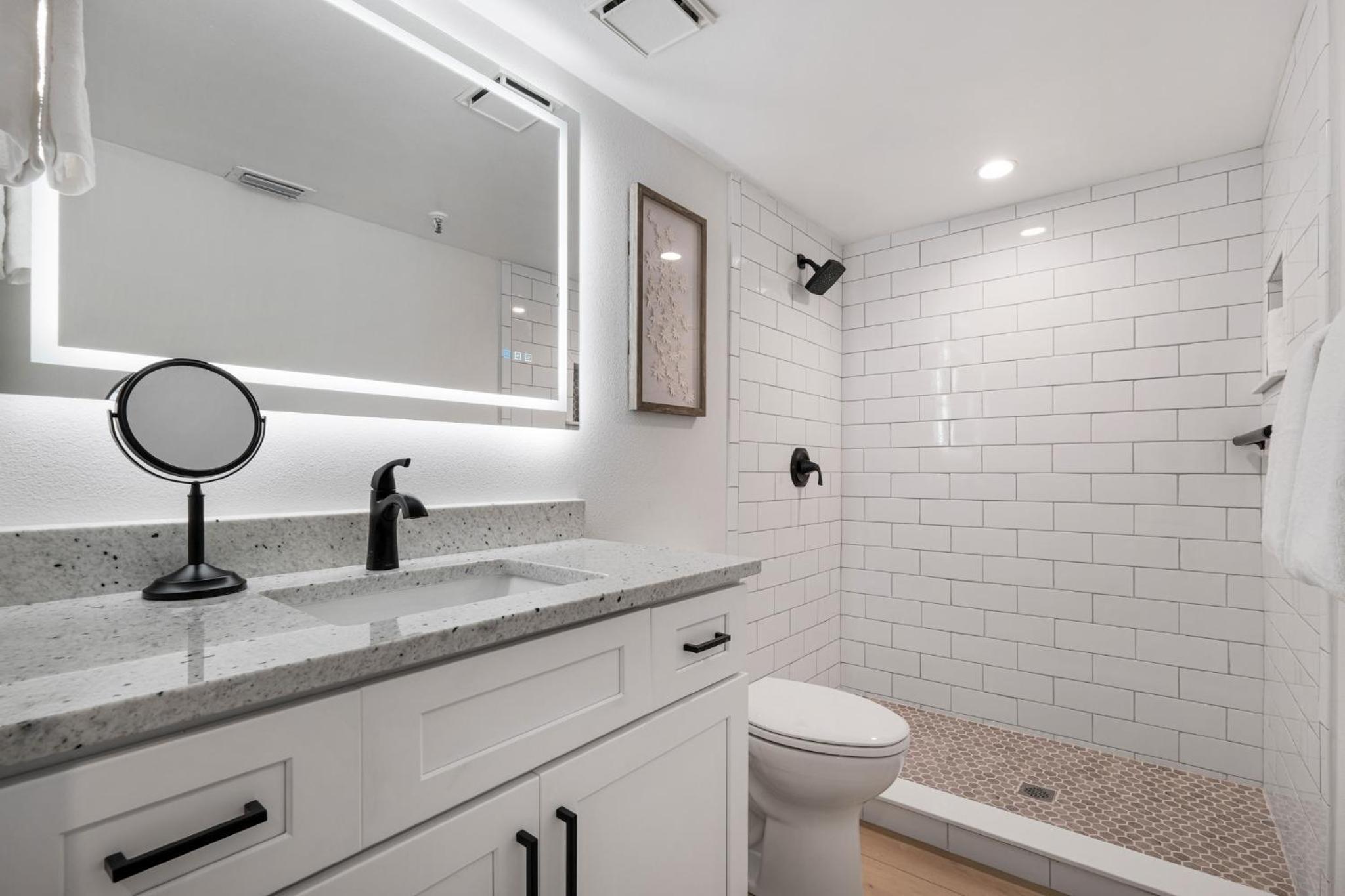 Updated direct oceanfront, ground floor condo with a heated pool and beach access