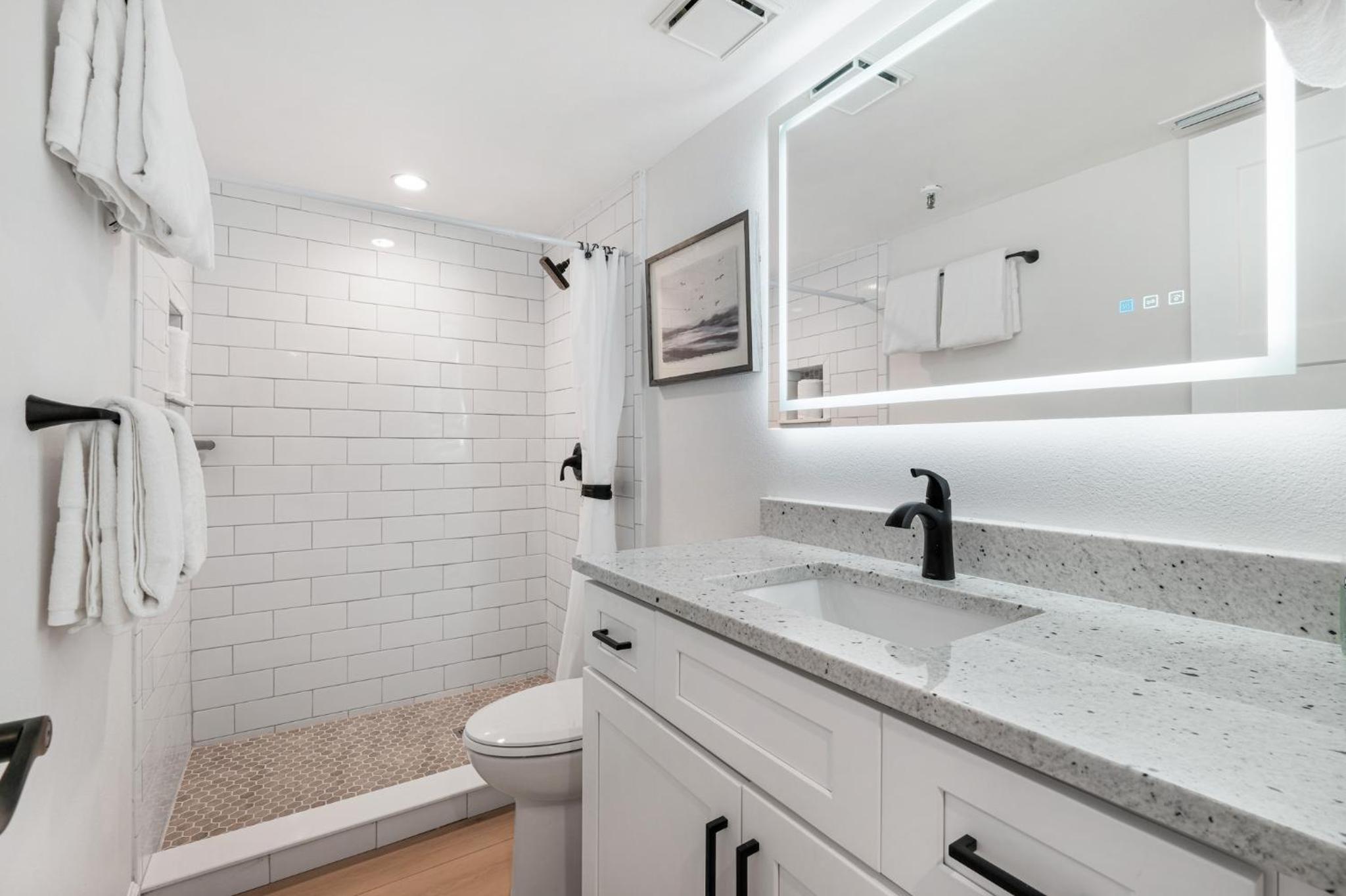 Updated direct oceanfront, ground floor condo with a heated pool and beach access
