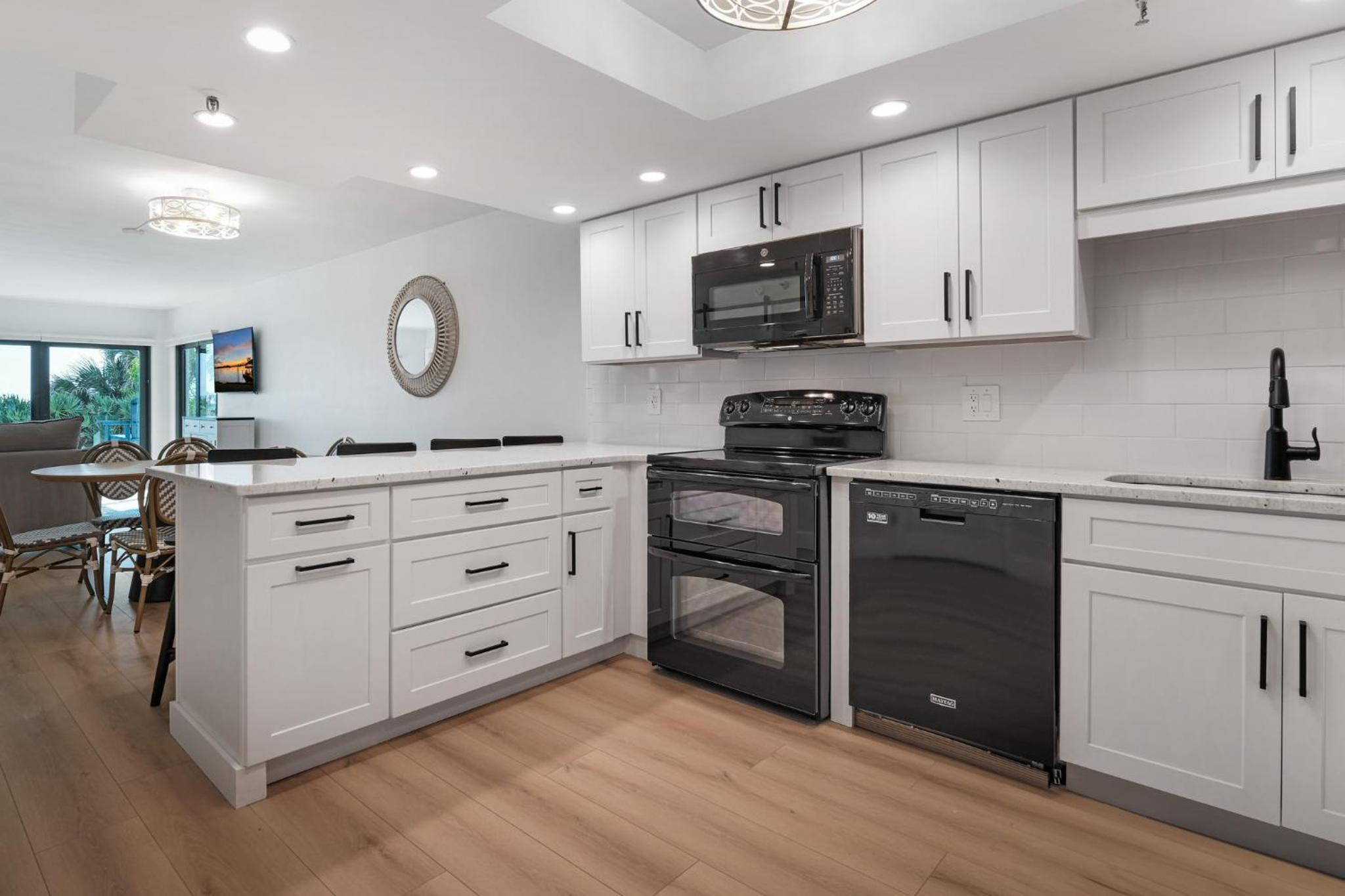 Updated direct oceanfront, ground floor condo with a heated pool and beach access