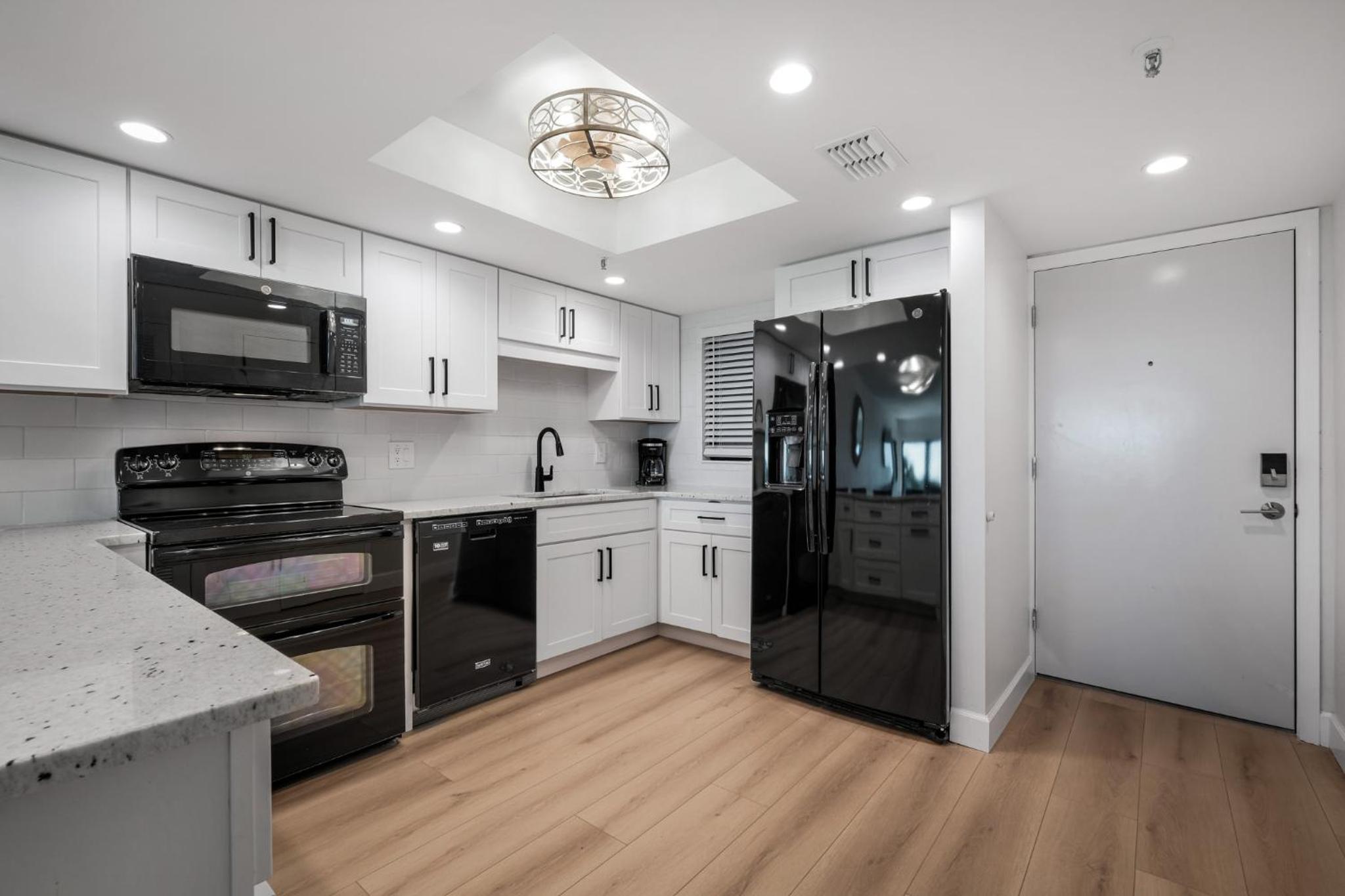 Updated direct oceanfront, ground floor condo with a heated pool and beach access