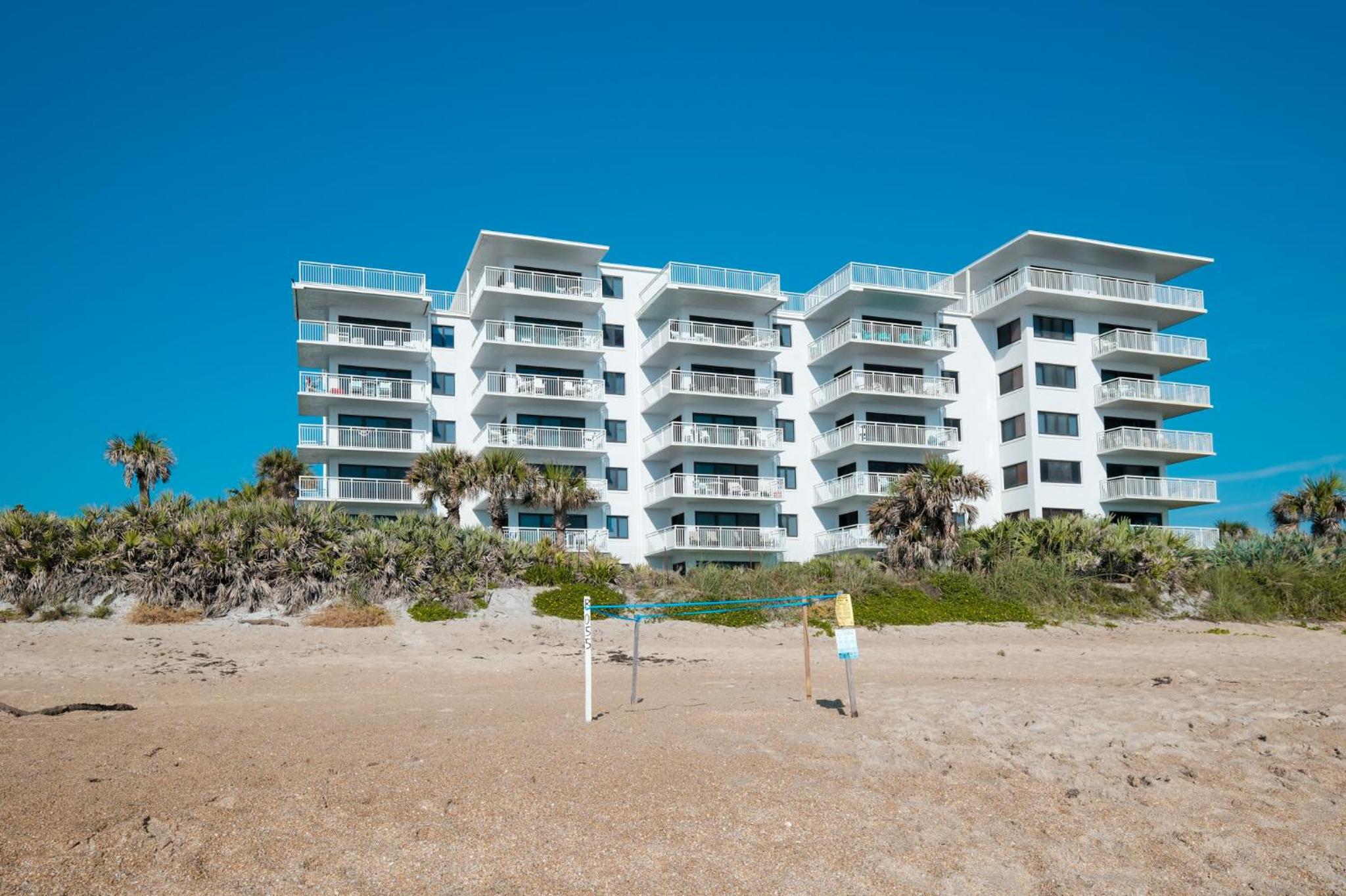 Updated direct oceanfront, ground floor condo with a heated pool and beach access