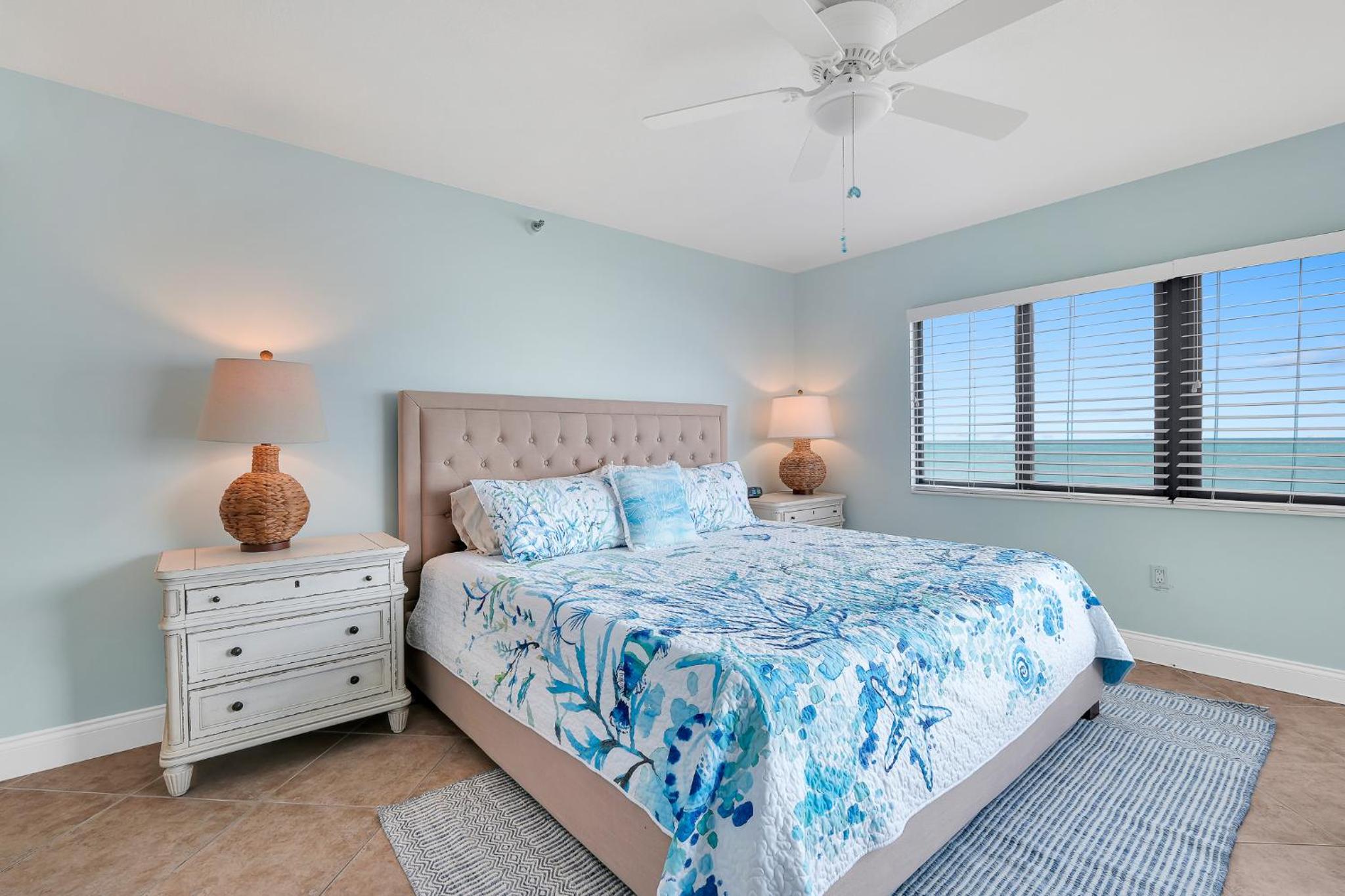 Updated direct oceanfront corner with a wrap-around balcony, heated pool and beach access