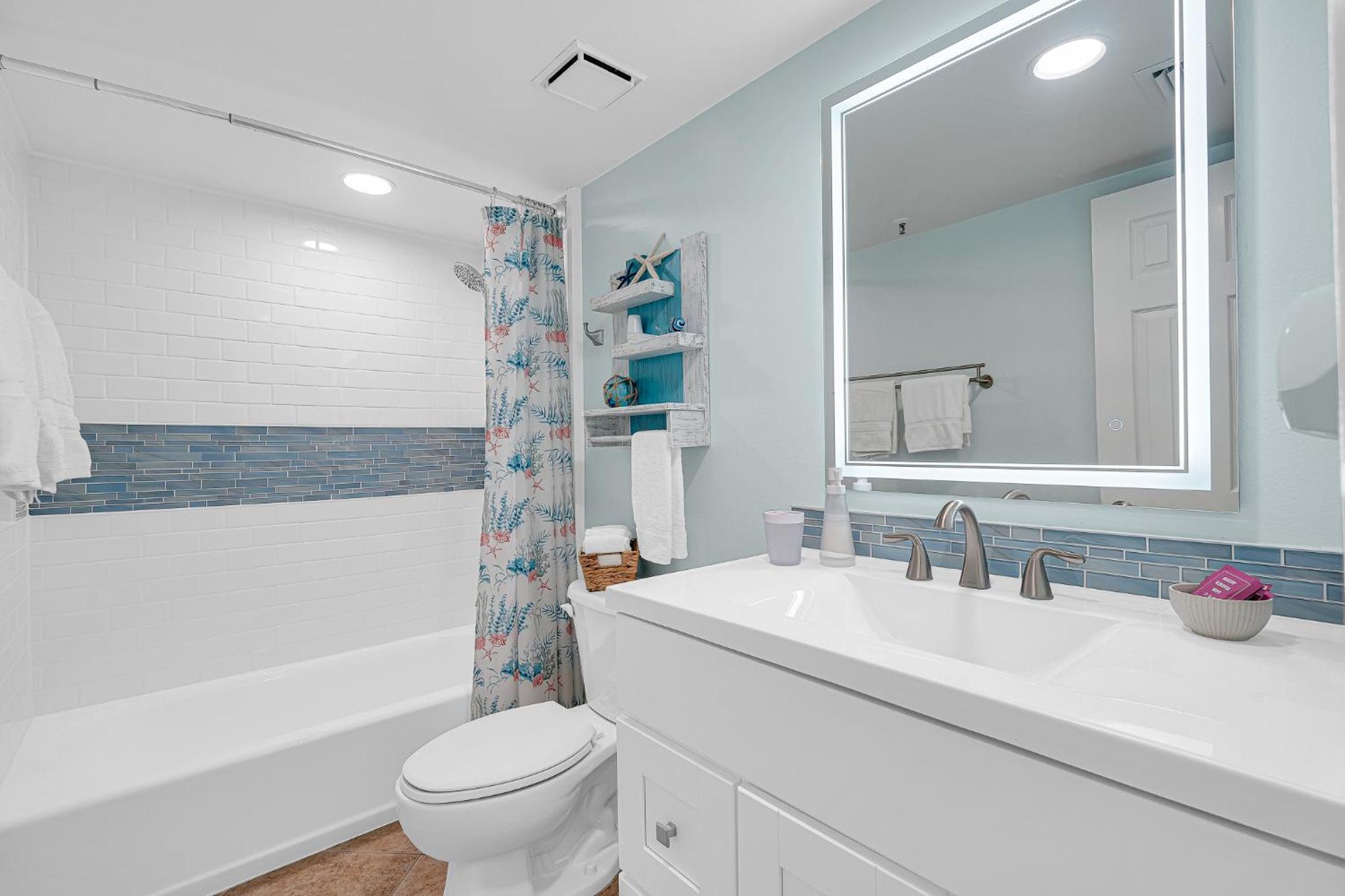 Updated direct oceanfront corner with a wrap-around balcony, heated pool and beach access
