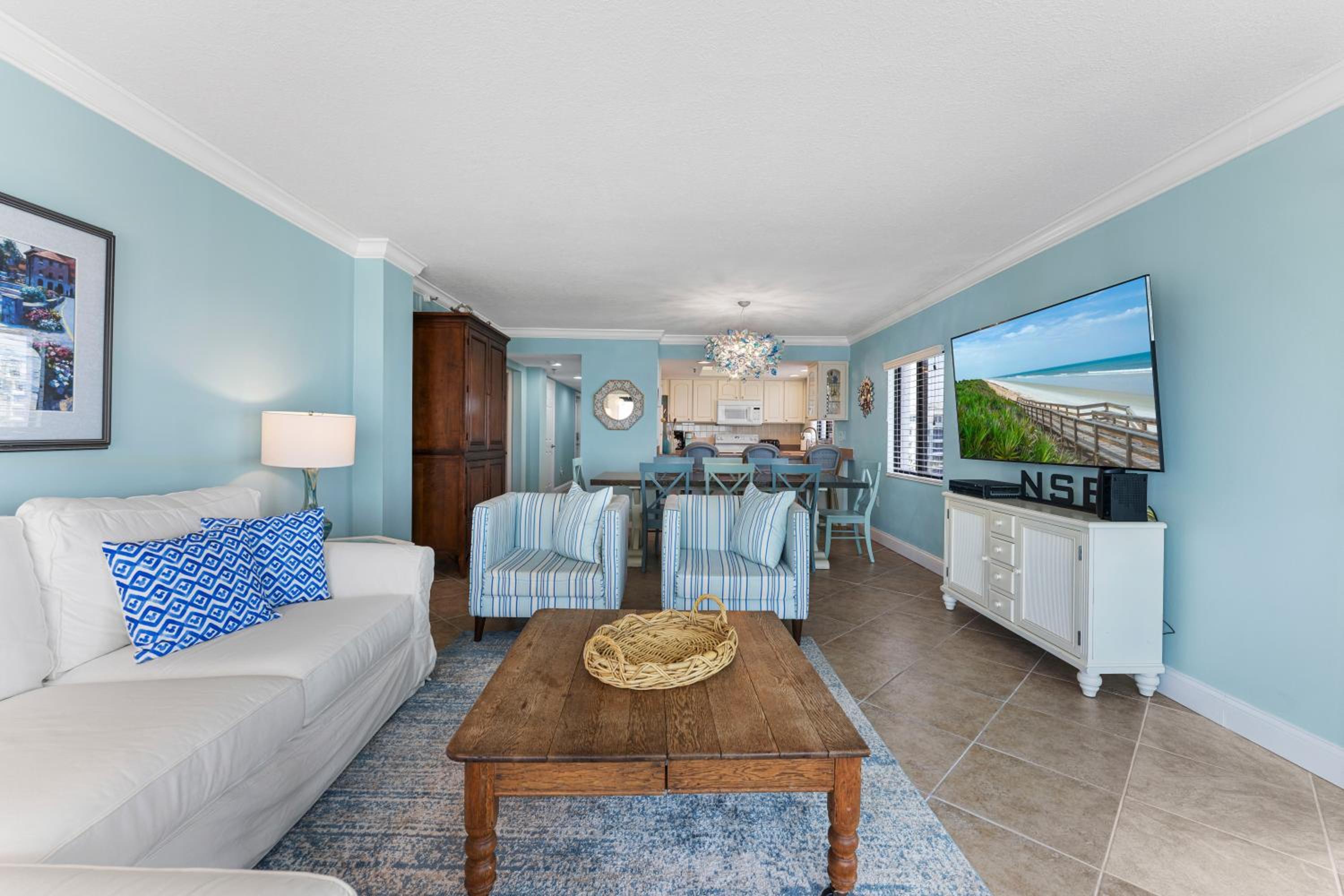 Updated direct oceanfront corner with a wrap-around balcony, heated pool and beach access