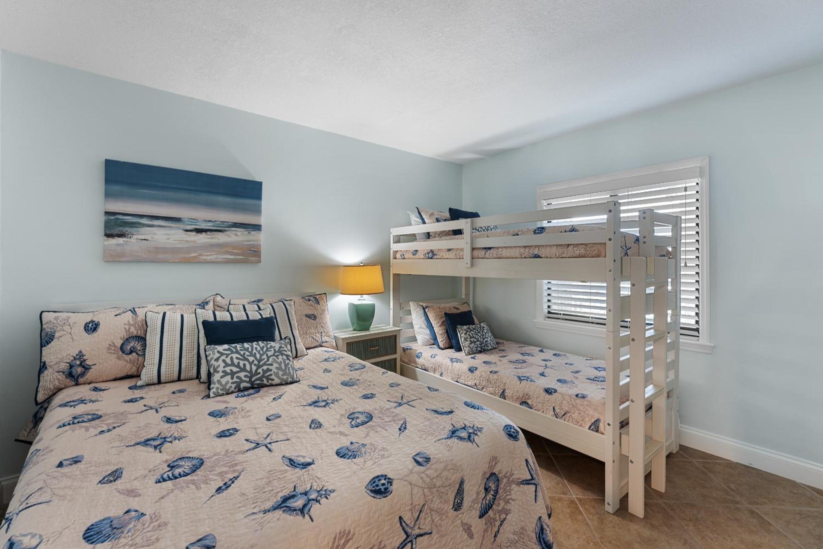 Updated direct oceanfront corner with a wrap-around balcony, heated pool and beach access