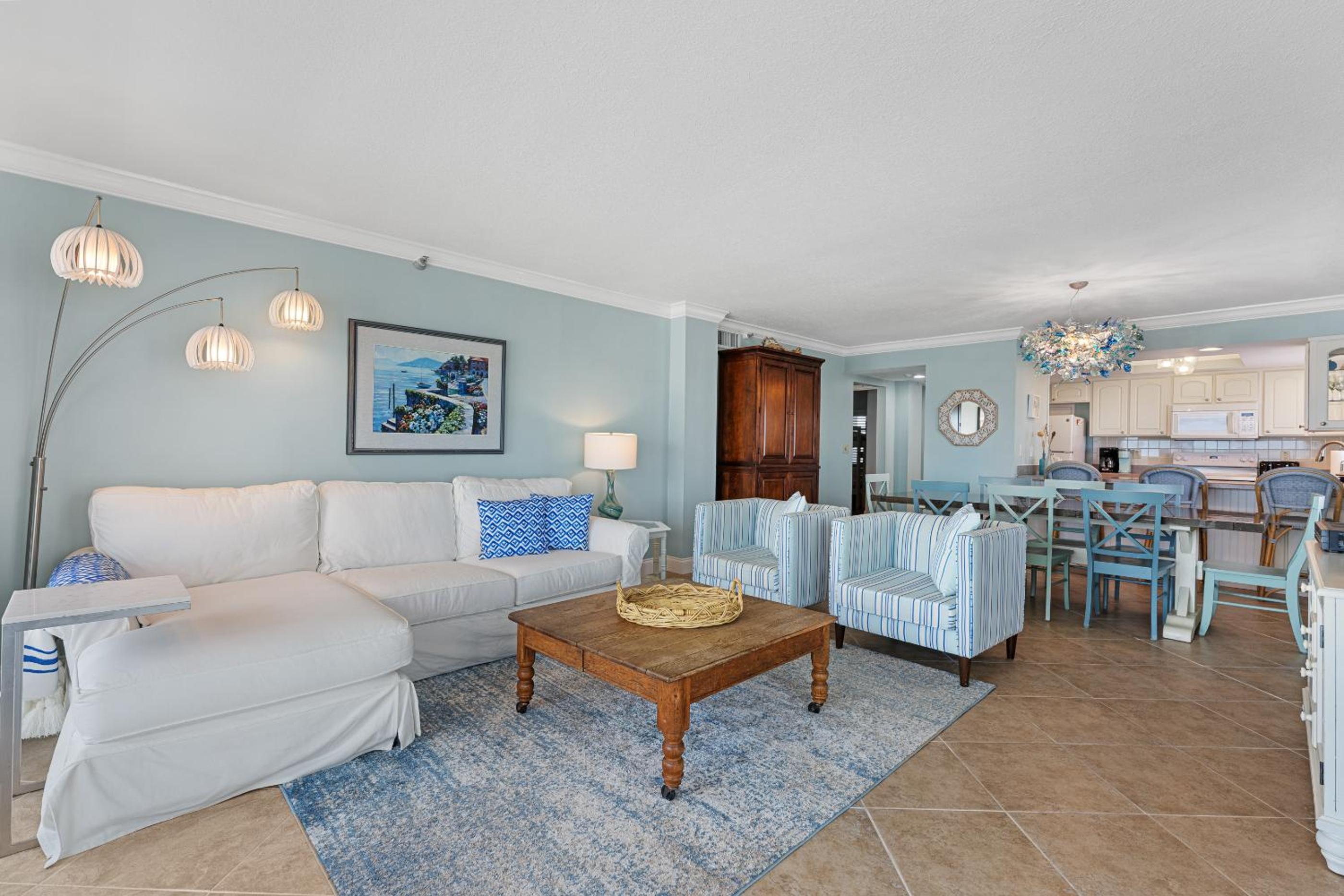 Updated direct oceanfront corner with a wrap-around balcony, heated pool and beach access