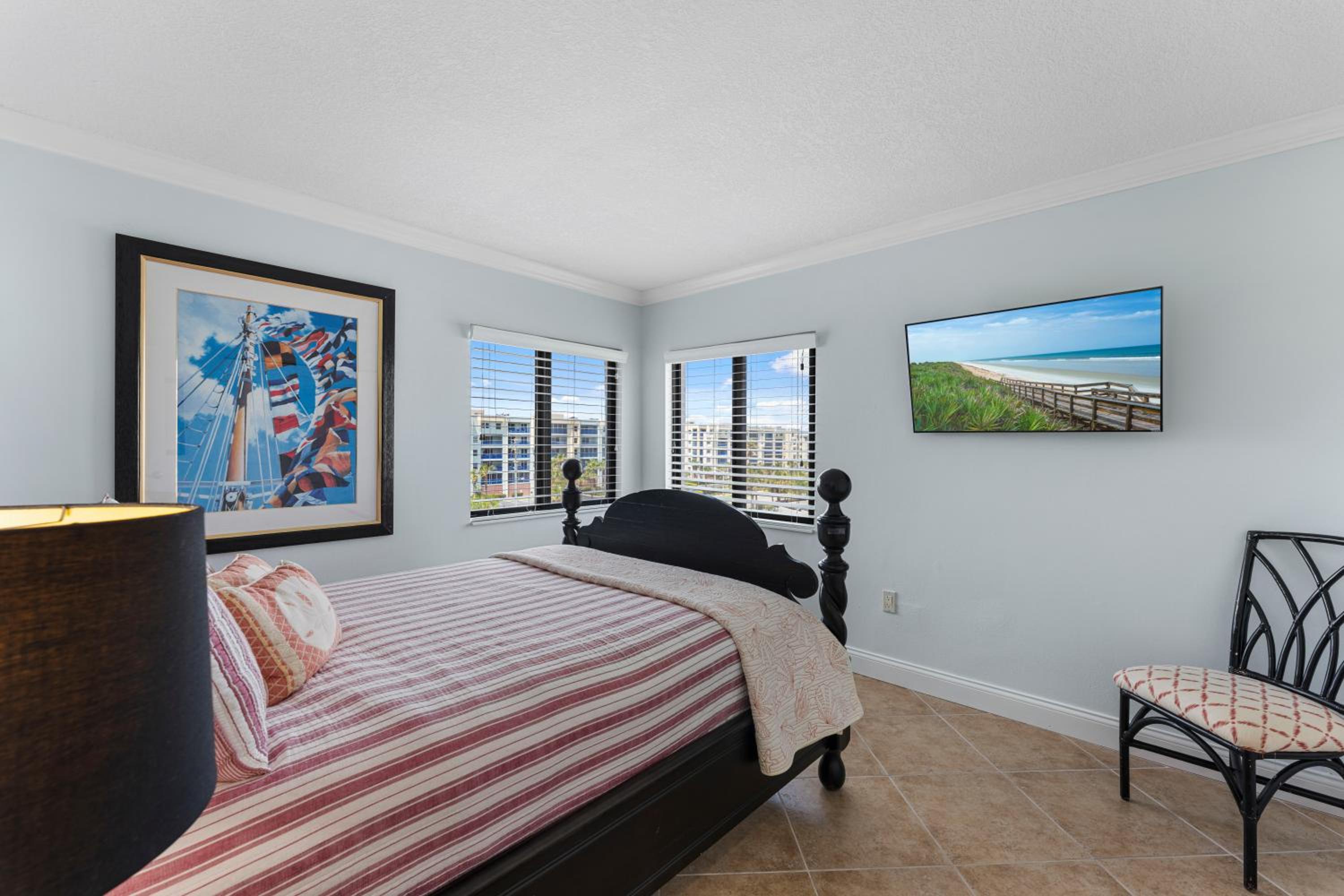 Updated direct oceanfront corner with a wrap-around balcony, heated pool and beach access