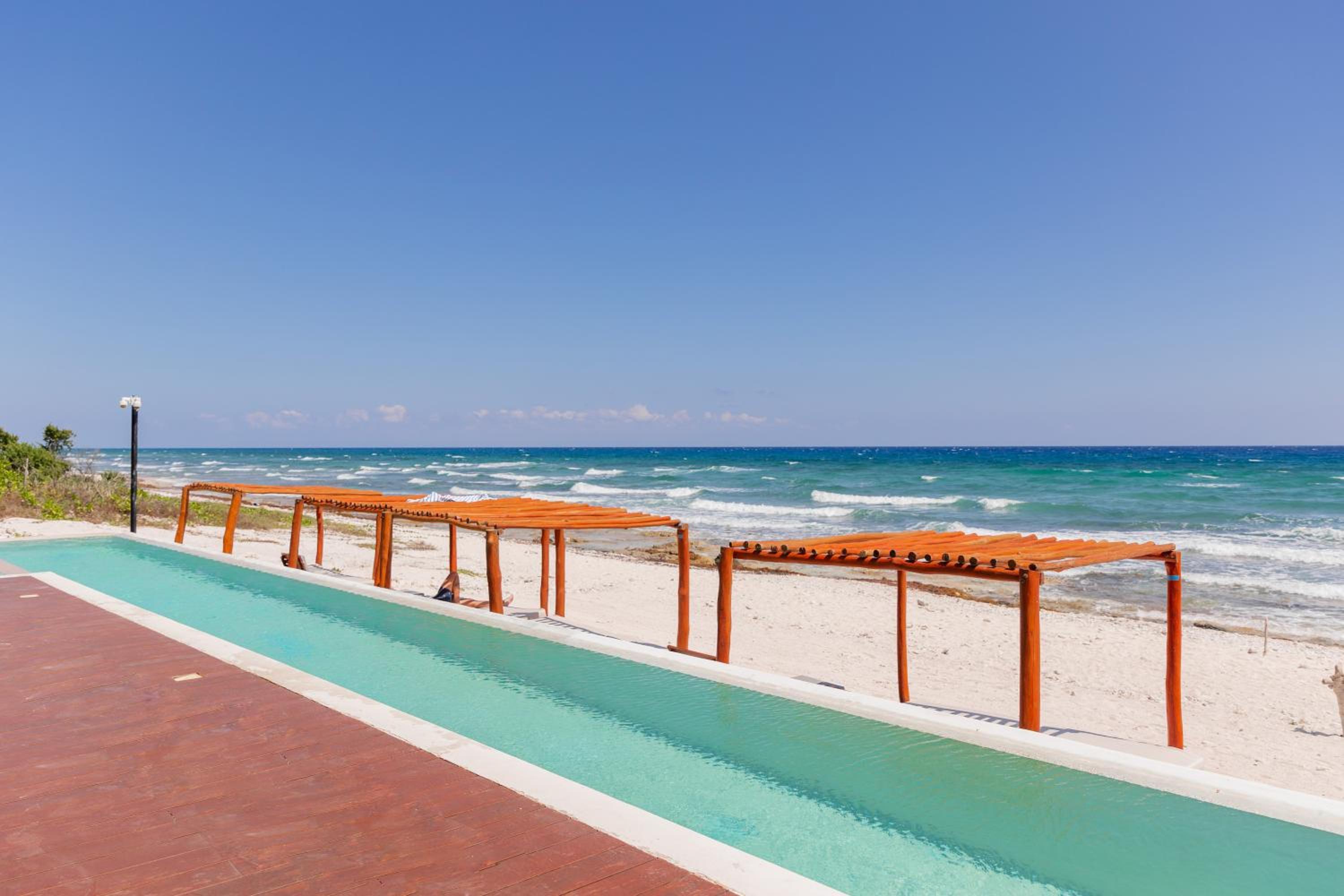 BT Homes - Tankah Bay Tulum - Exclusivos apartamentos con piscina a metros del mar