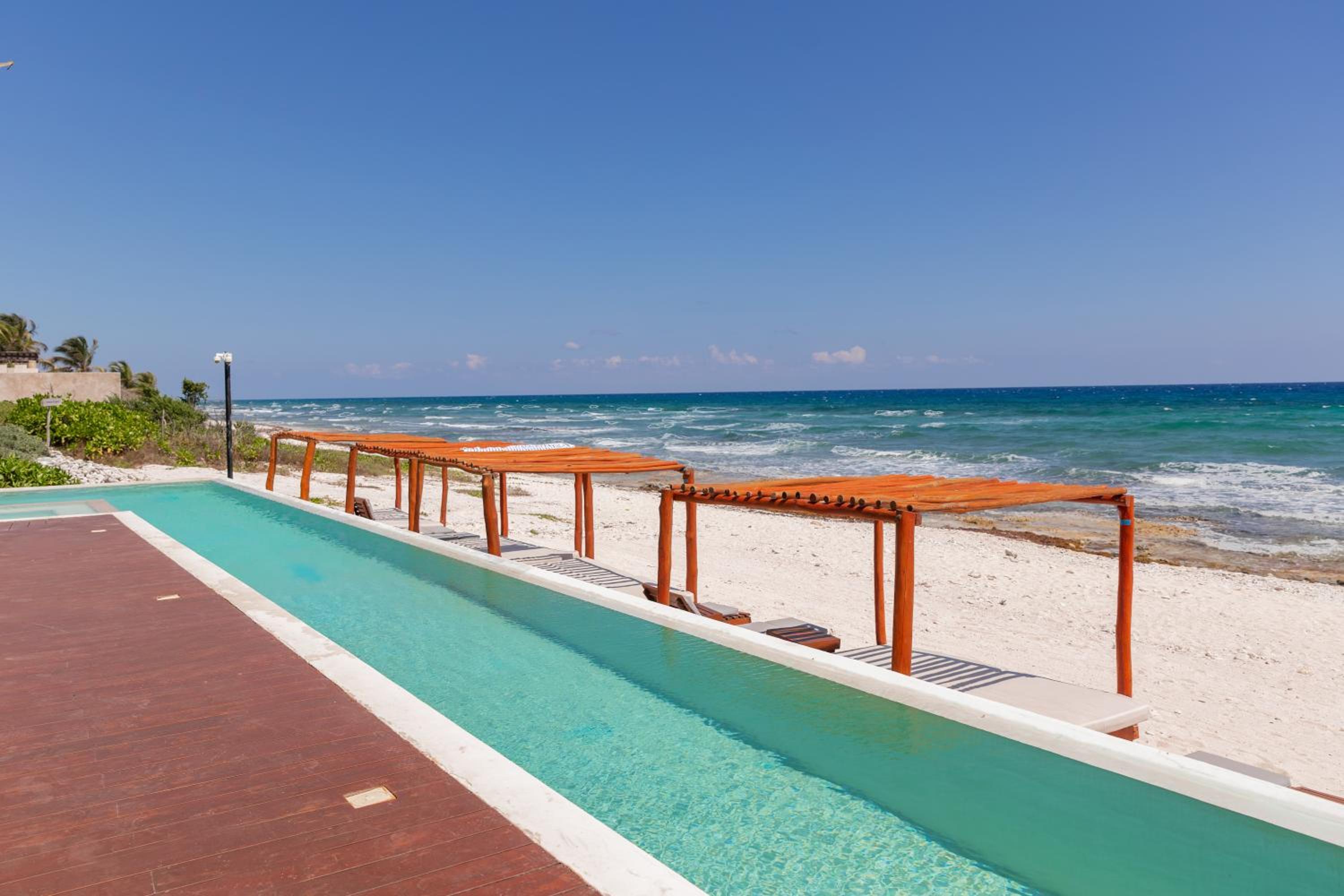 BT Homes - Tankah Bay Tulum - Exclusivos apartamentos con piscina a metros del mar