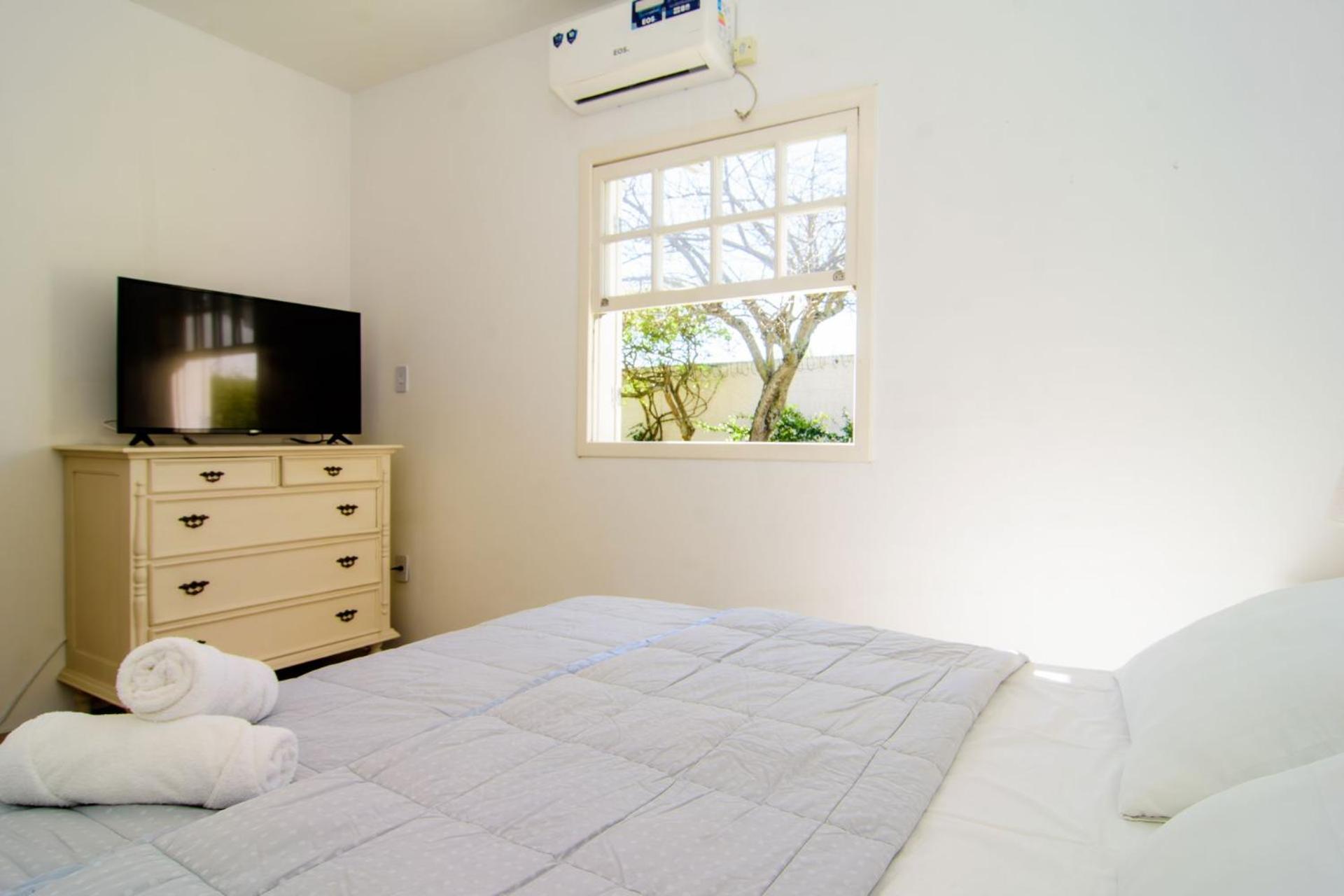 Casa c/ar cond. rua da praia, cond. fechado HK0945
