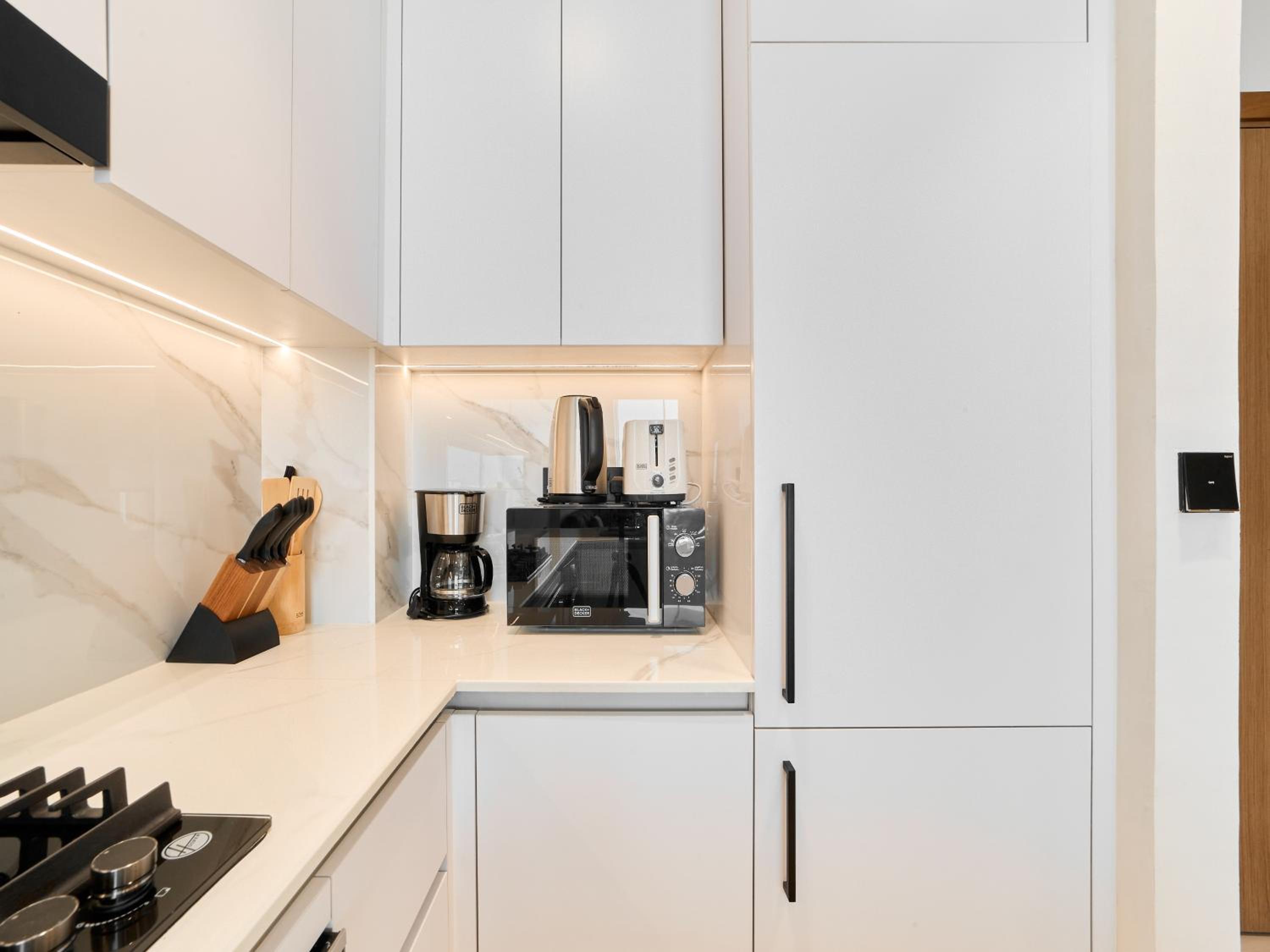 FAM Living Minimalist 1BR Gem in Binghatti Amber