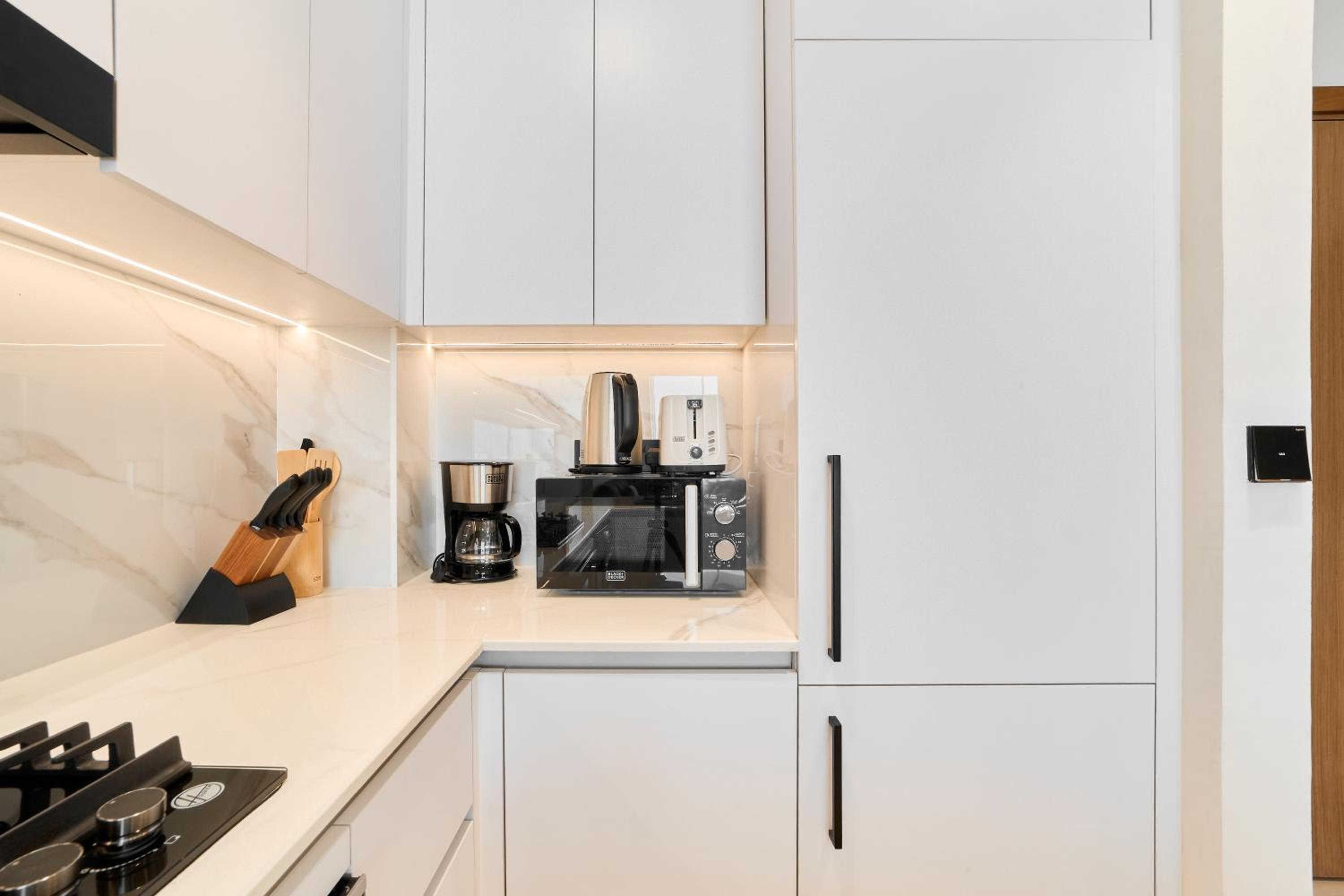 FAM Living Minimalist 1BR Gem in Binghatti Amber