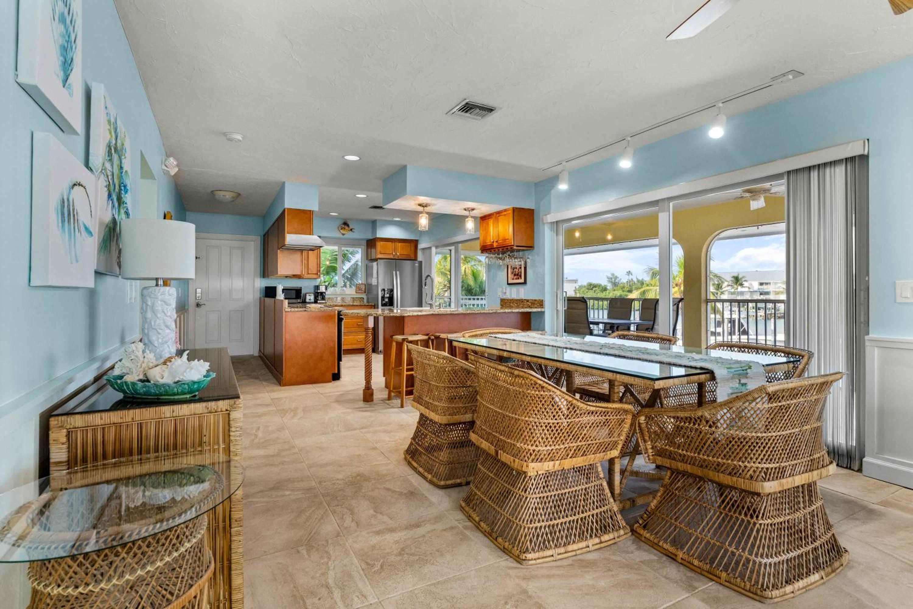 Sunset Harbor Waterfront Villa with Dock Cabana Club