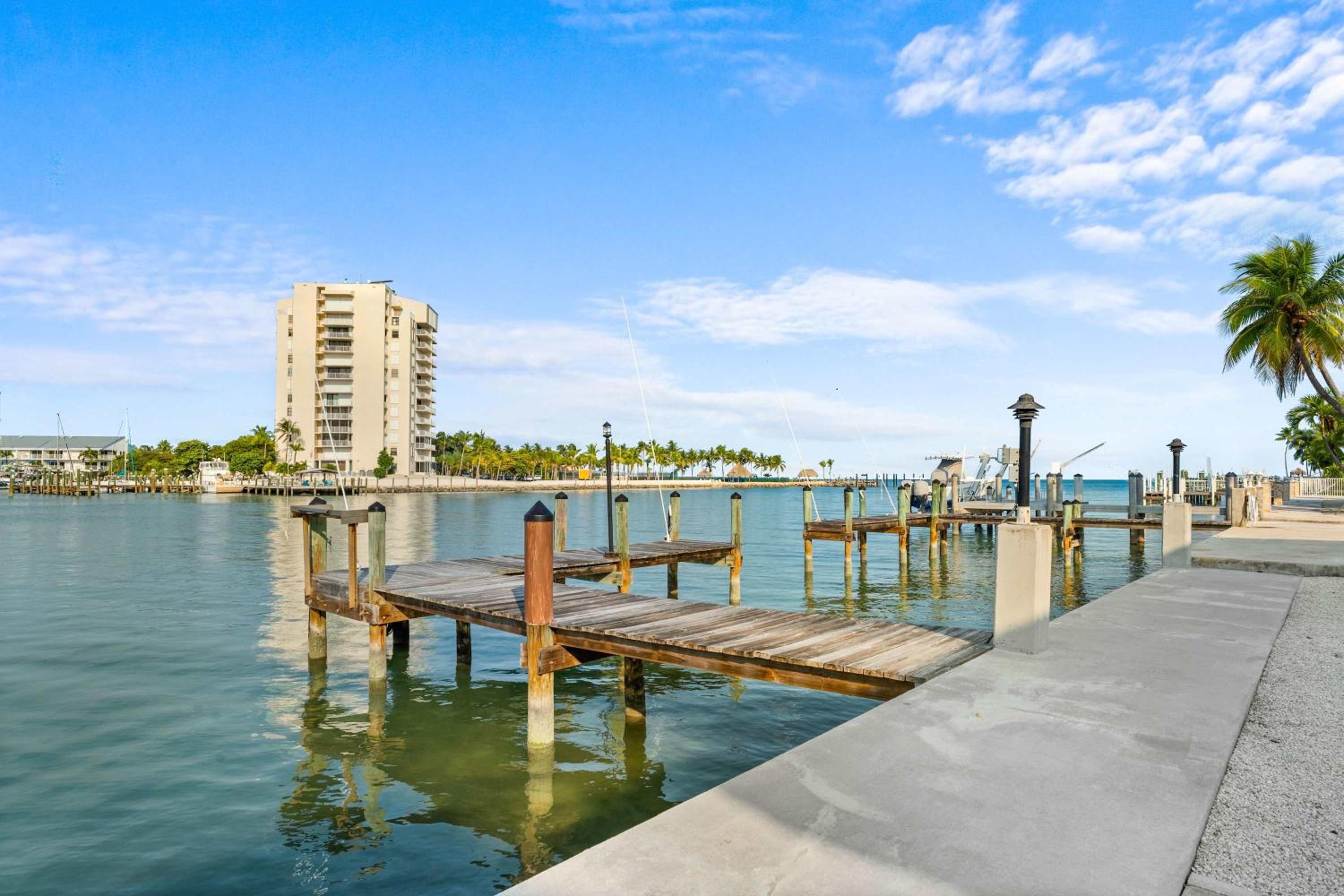 Sunset Harbor Waterfront Villa with Dock Cabana Club