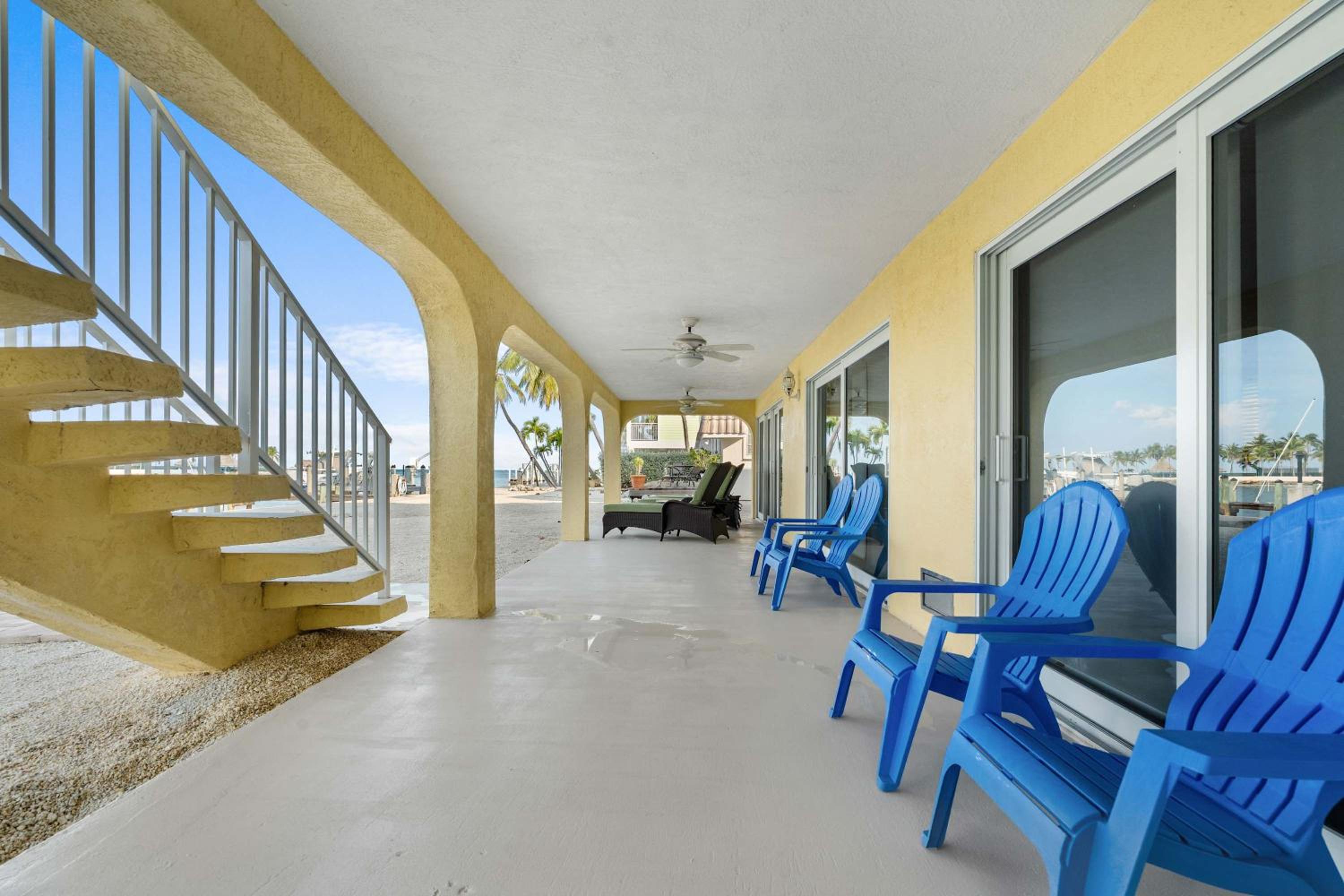 Sunset Harbor Waterfront Villa with Dock Cabana Club
