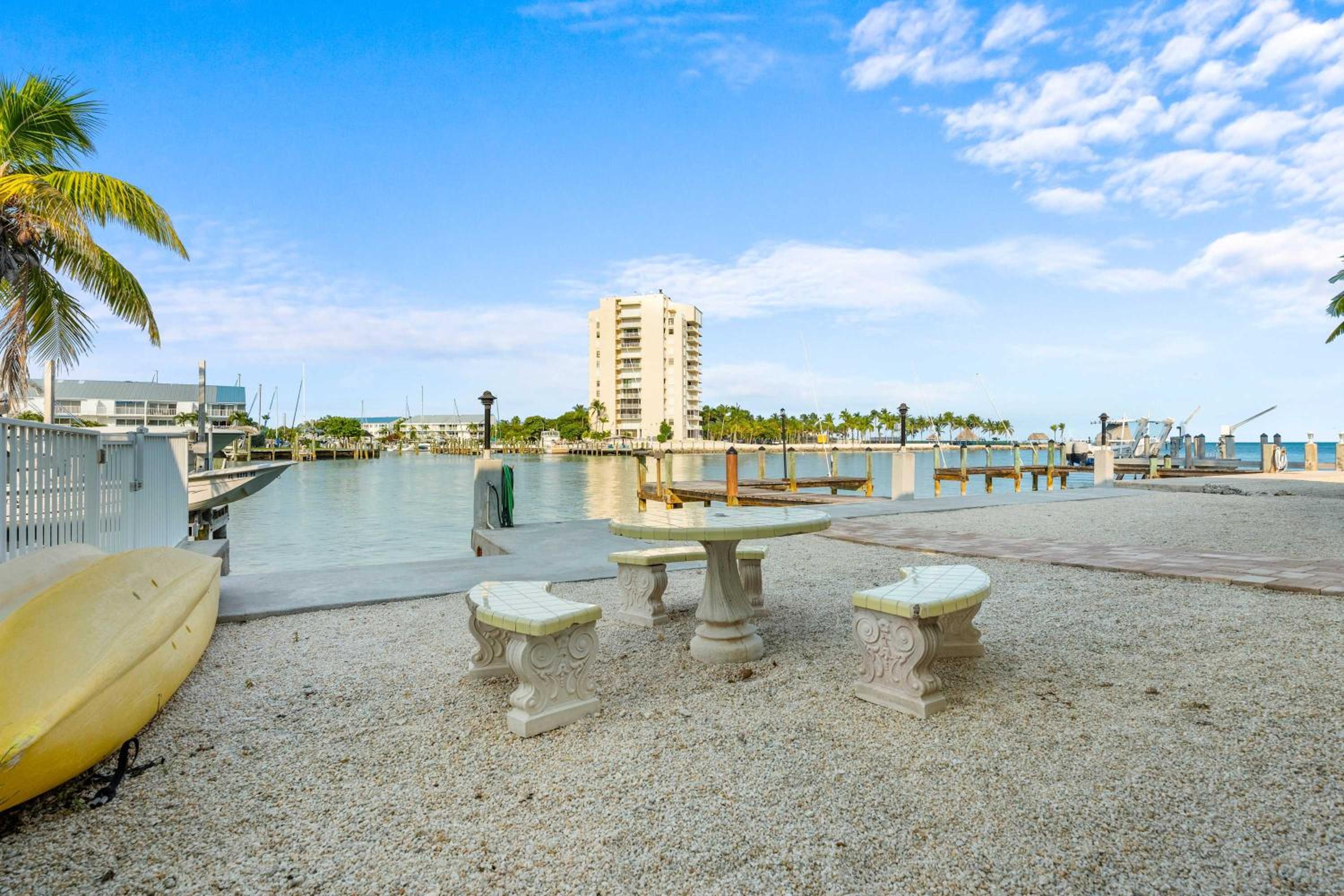 Sunset Harbor Waterfront Villa with Dock Cabana Club