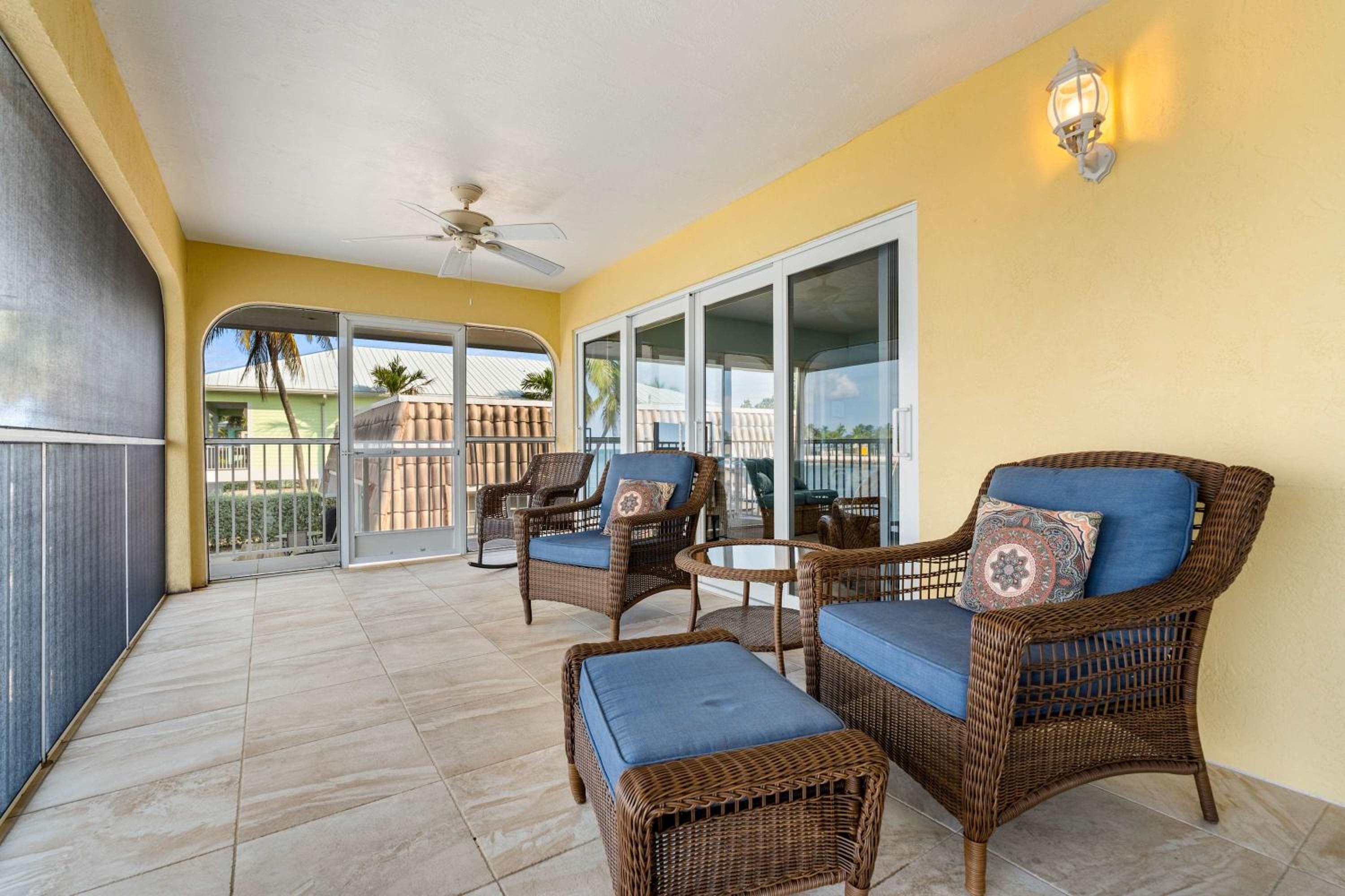 Sunset Harbor Waterfront Villa with Dock Cabana Club