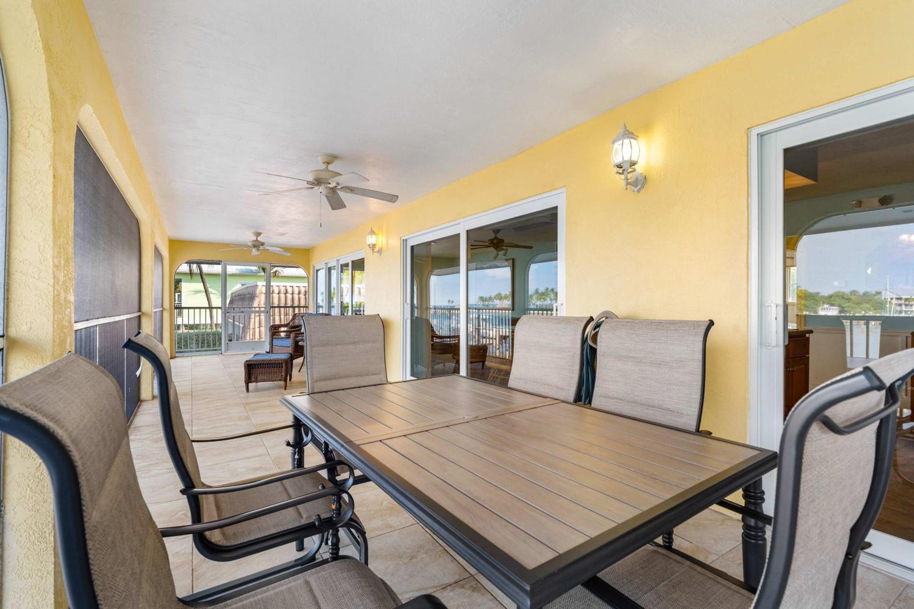Sunset Harbor Waterfront Villa with Dock Cabana Club