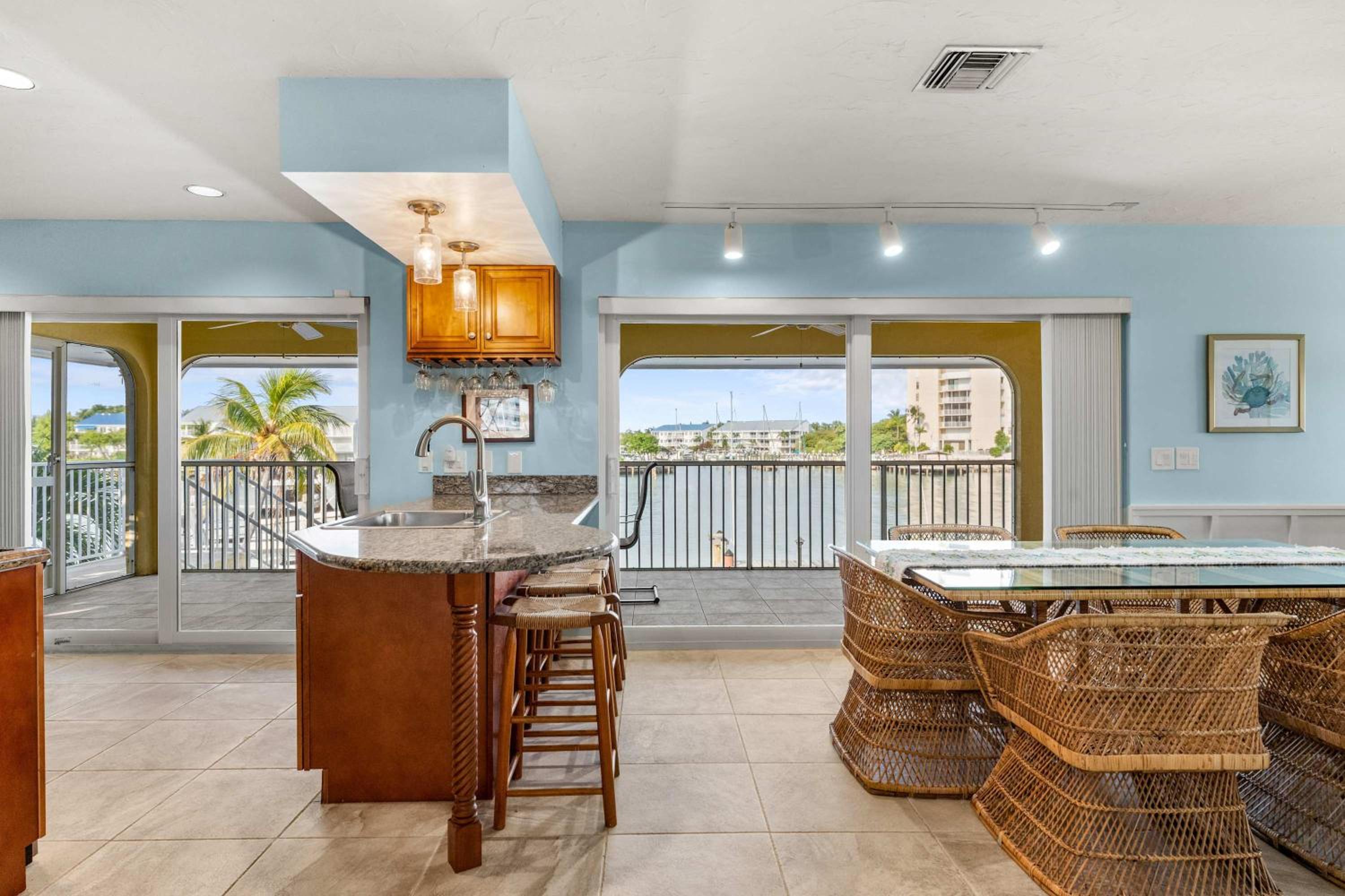 Sunset Harbor Waterfront Villa with Dock Cabana Club