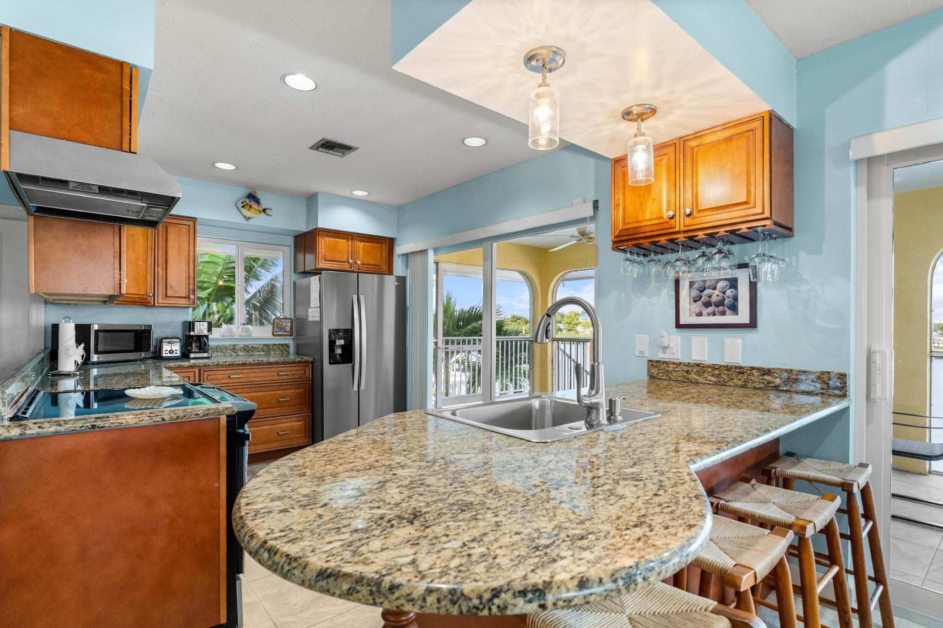 Sunset Harbor Waterfront Villa with Dock Cabana Club
