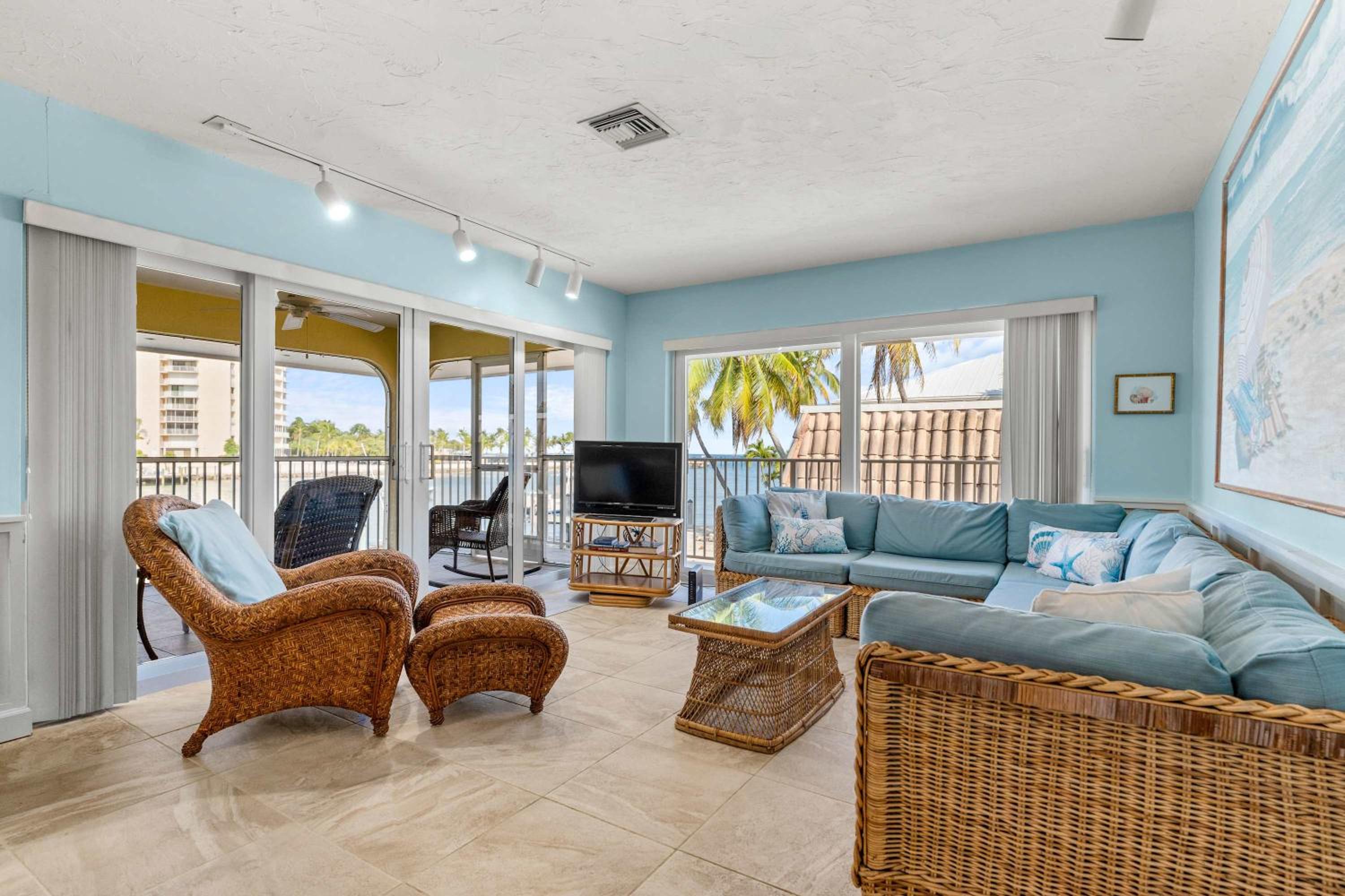 Sunset Harbor Waterfront Villa with Dock Cabana Club