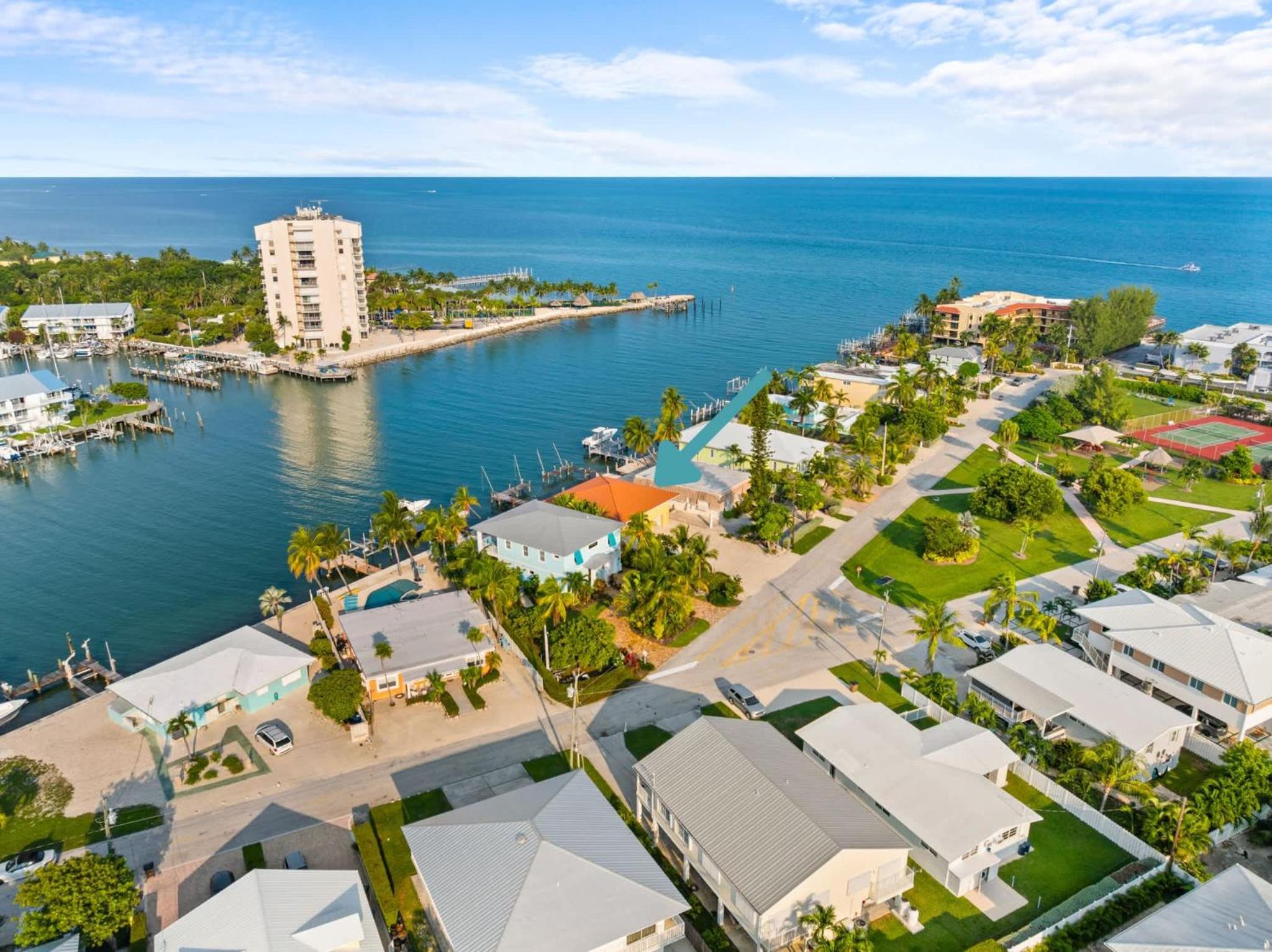 Sunset Harbor Waterfront Villa with Dock Cabana Club