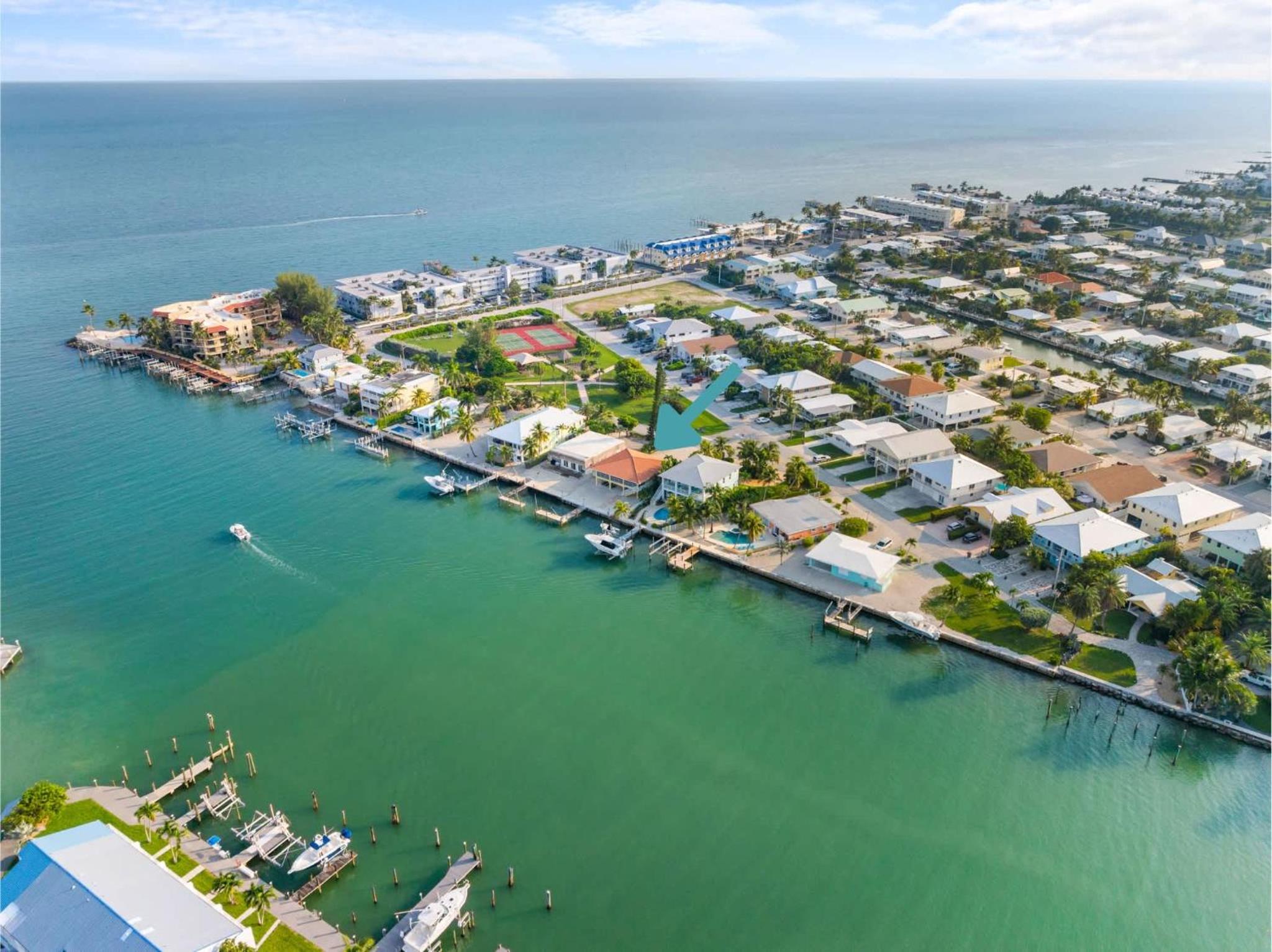 Sunset Harbor Waterfront Villa with Dock Cabana Club