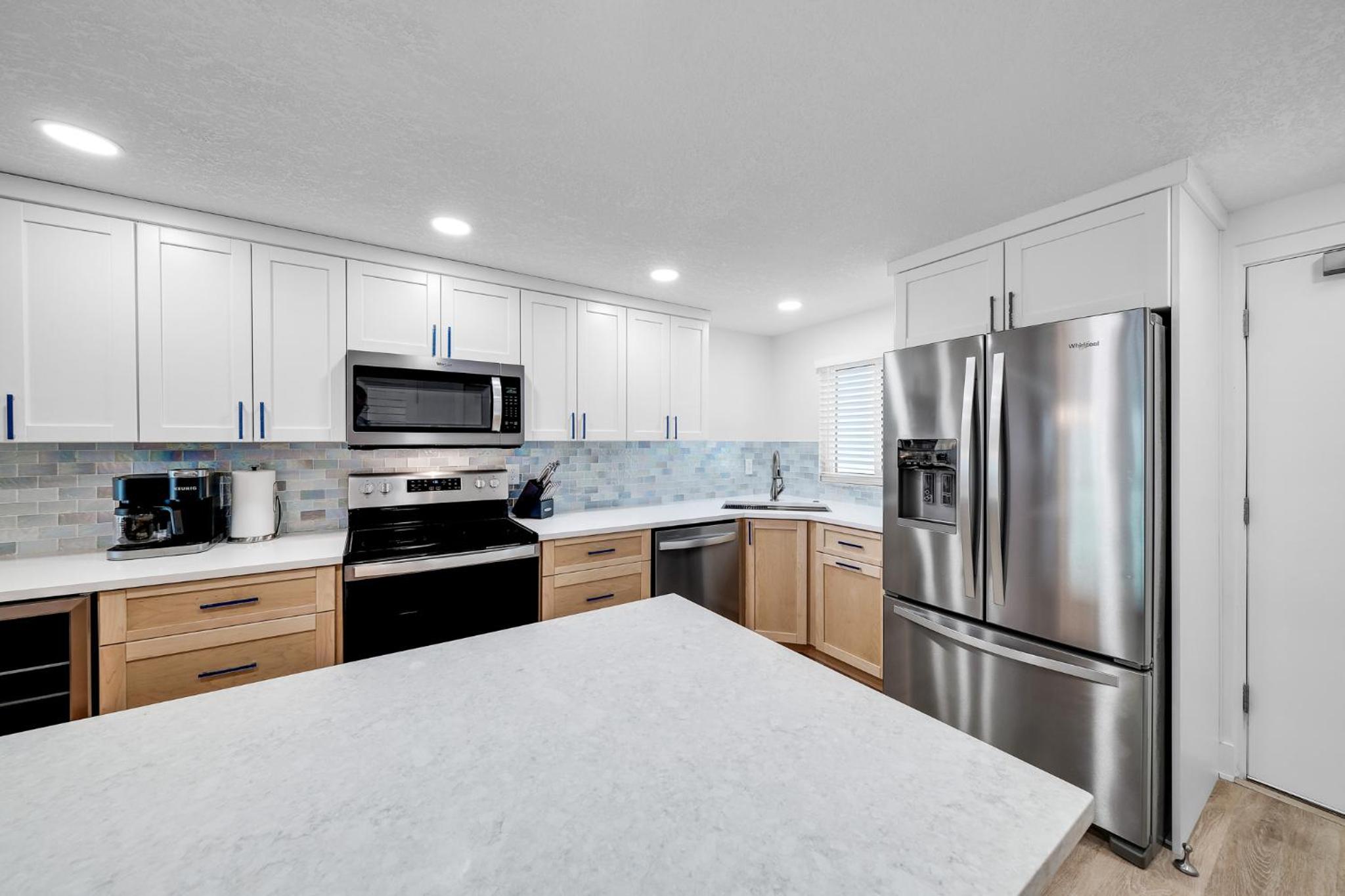 Fully renovated direct oceanfront condo with a large balcony, heated pool and beach access